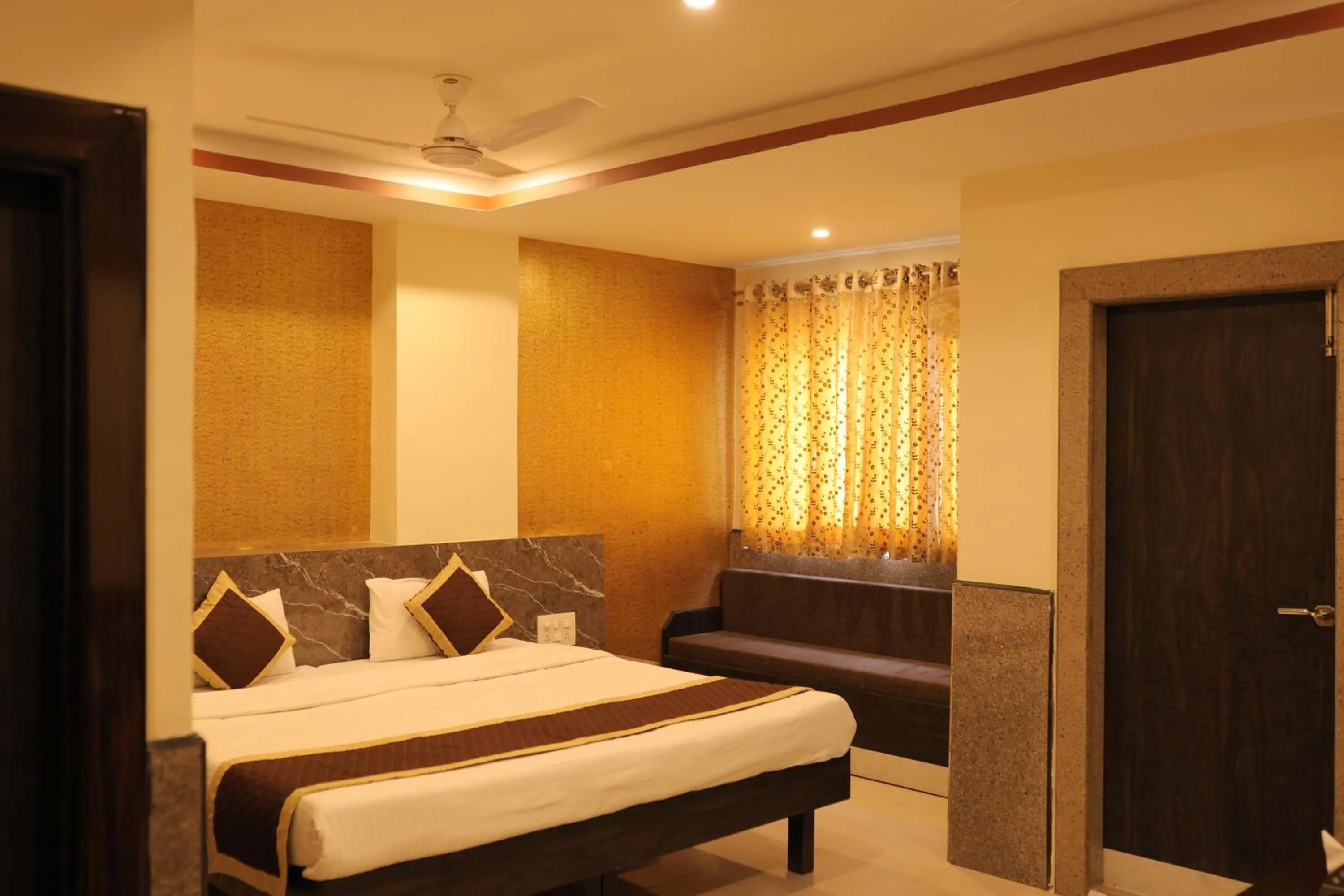 Bed in Nakshatra Hotel