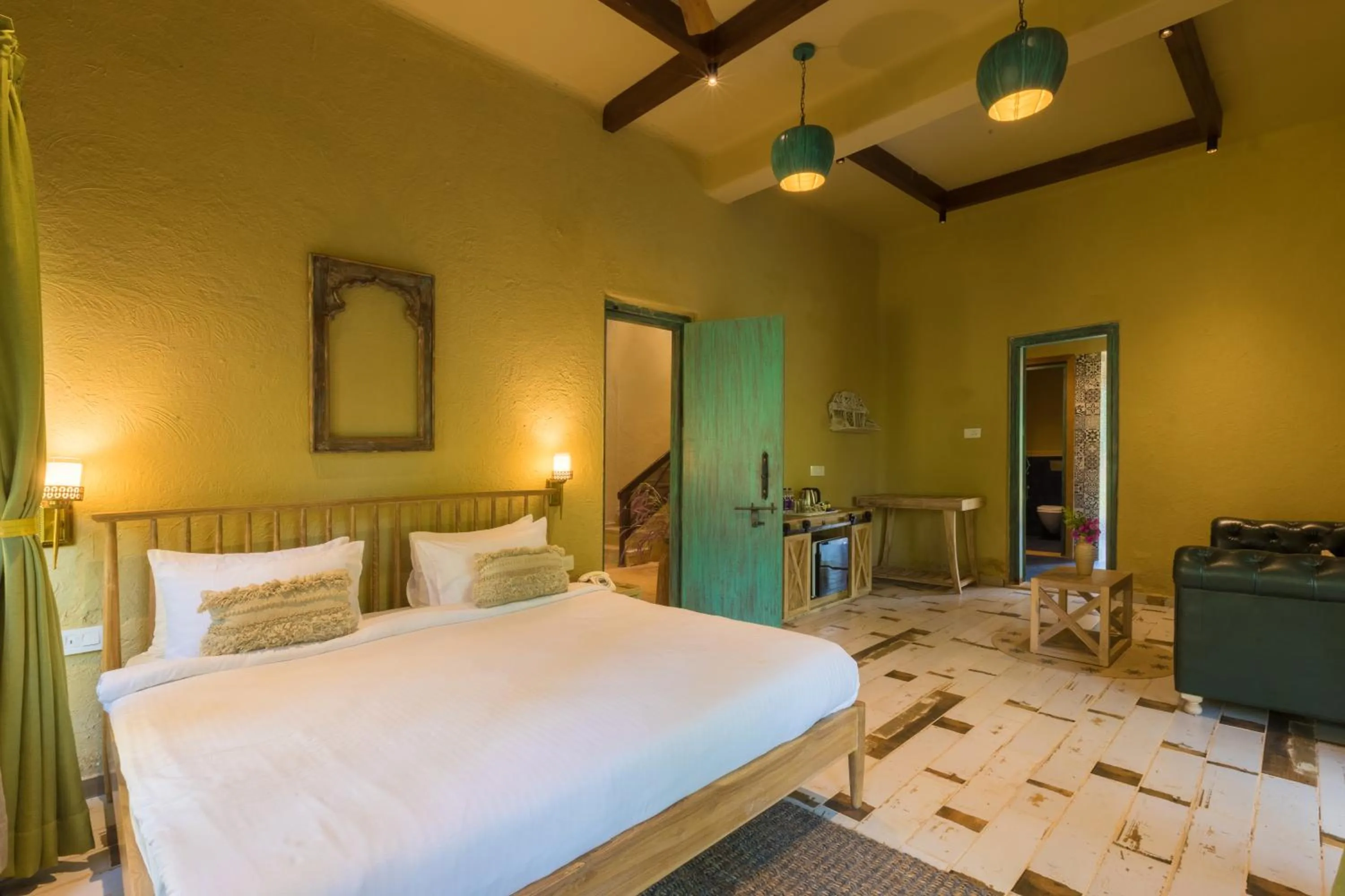 Bed in Vannraj Resort And Spa