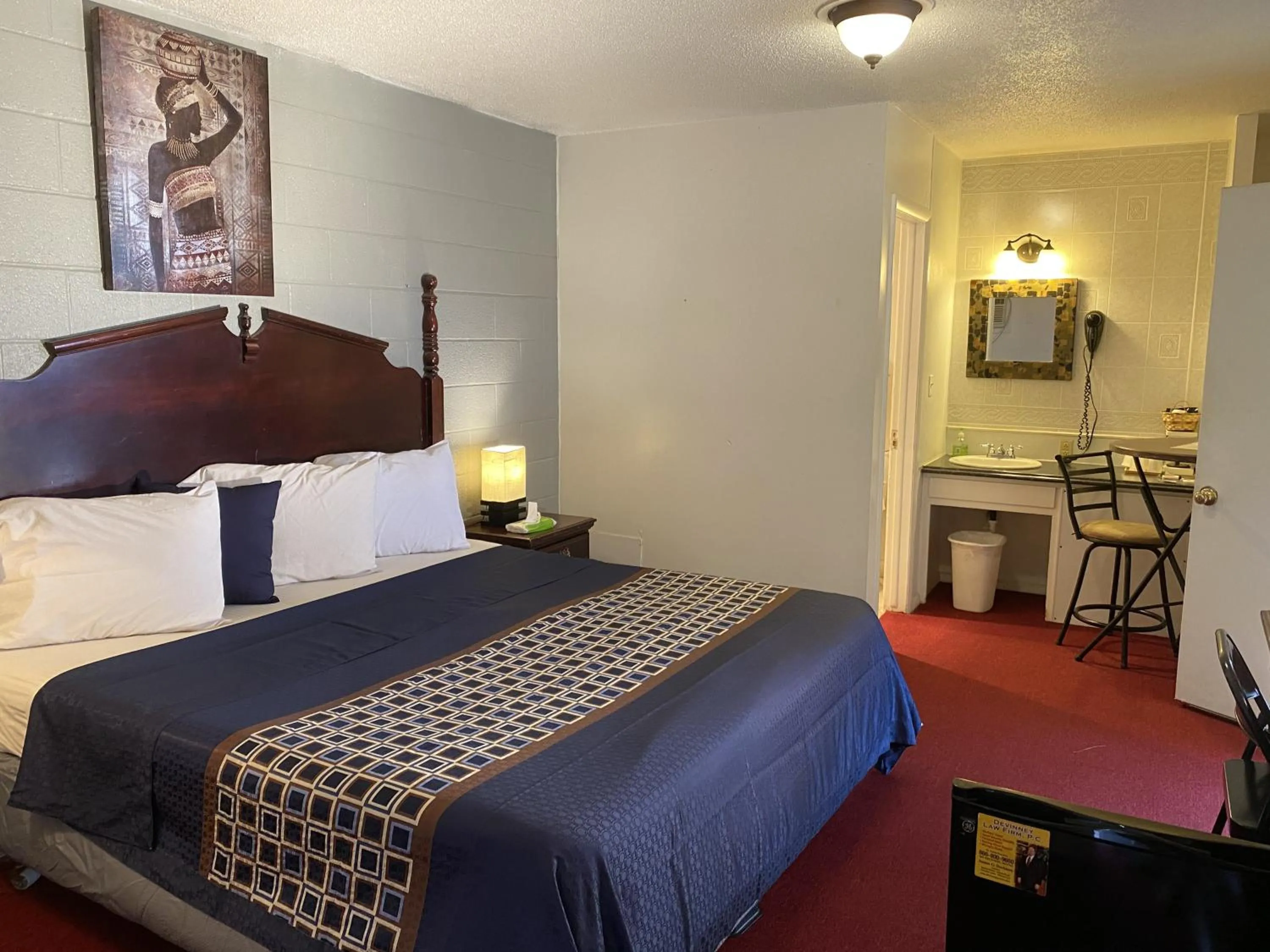 Bed in Knights Inn Fairview