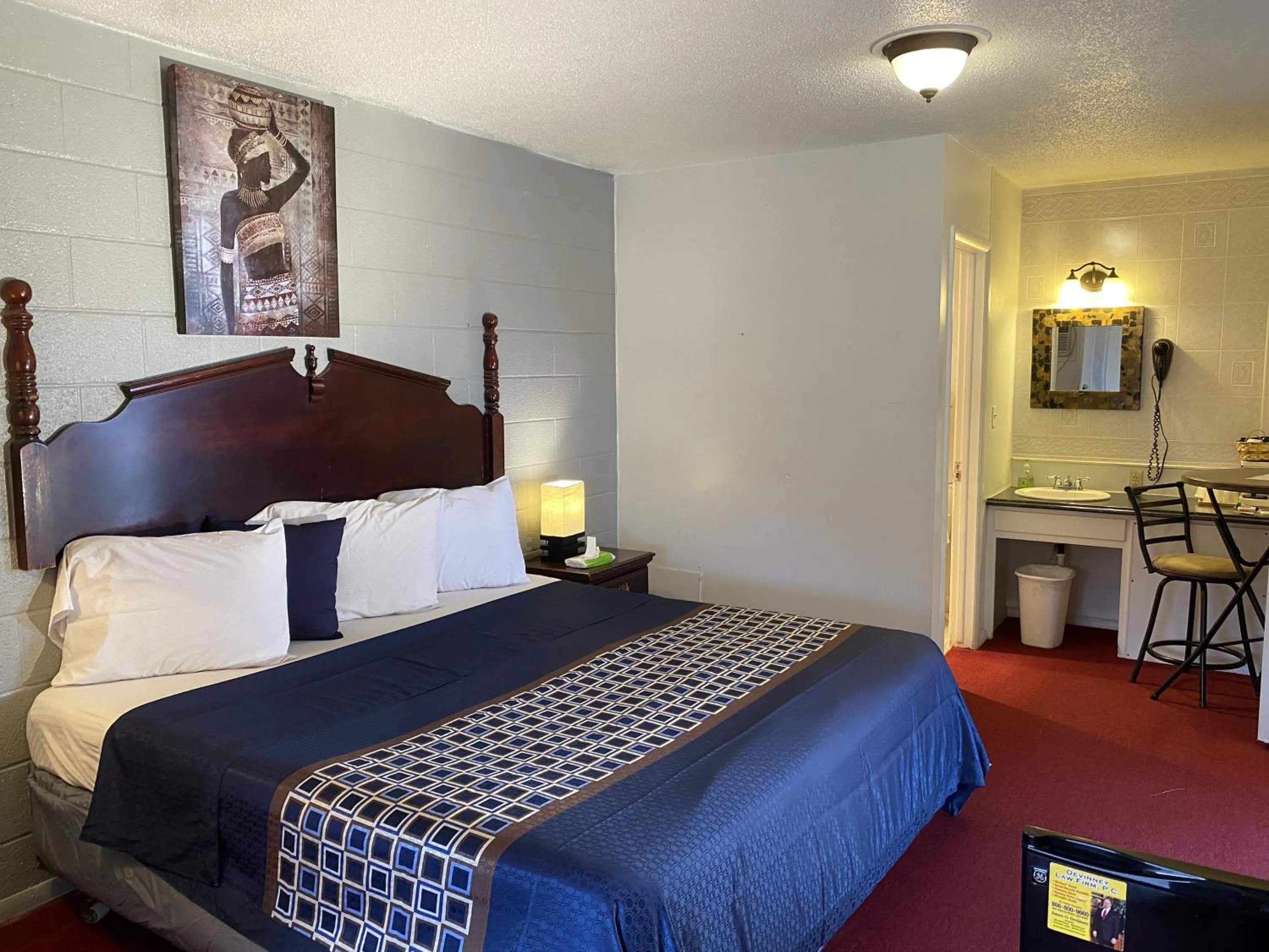 Bed in Knights Inn Fairview