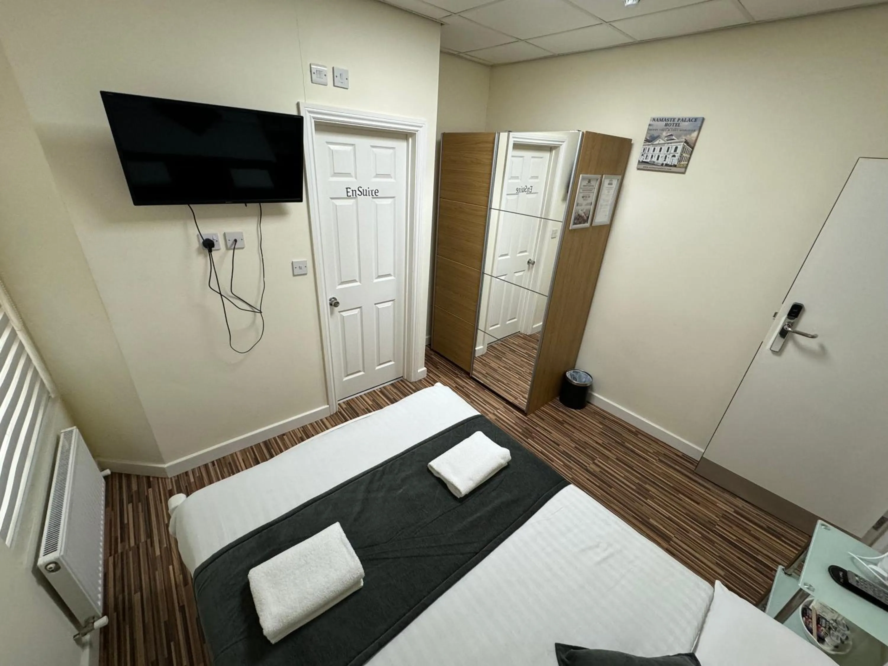 Bed in Namaste Palace Hotel