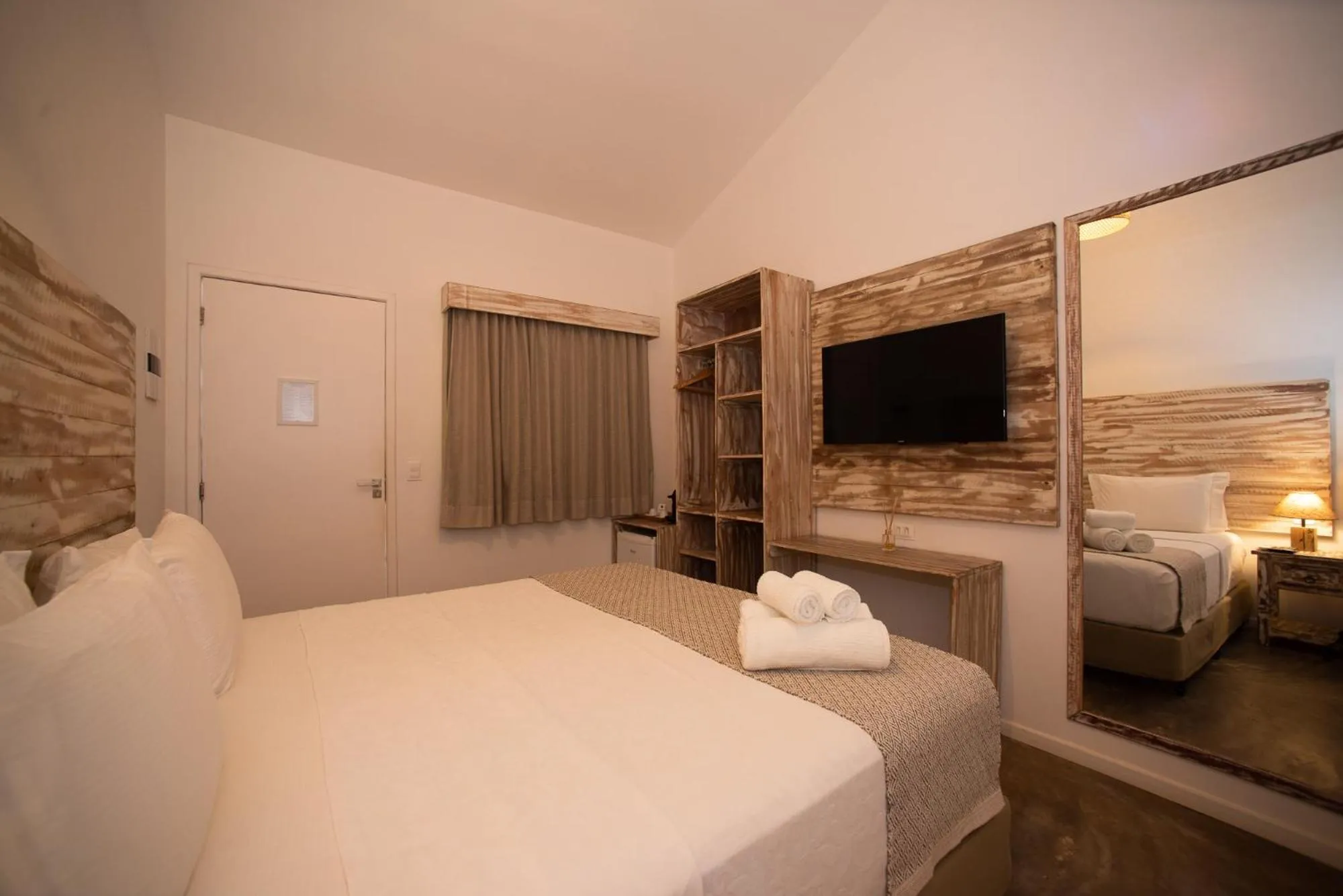 Bed in Pousada Tubarão