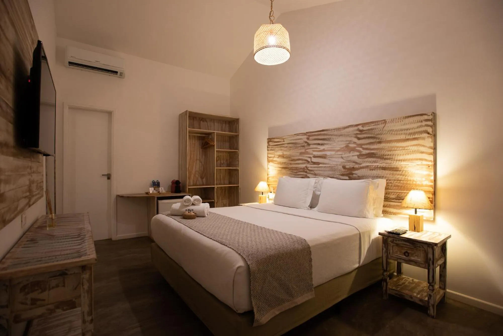 Bed in Pousada Tubarão