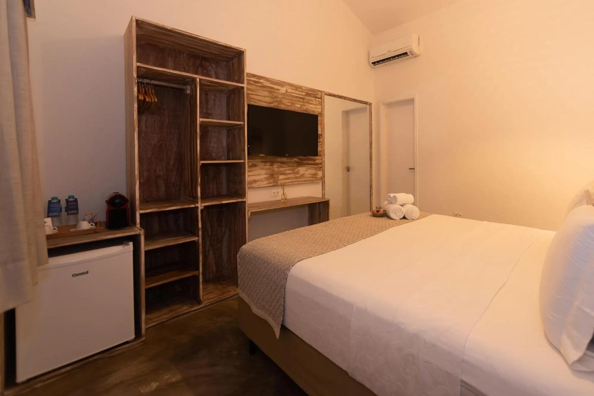 Bed in Pousada Tubarão