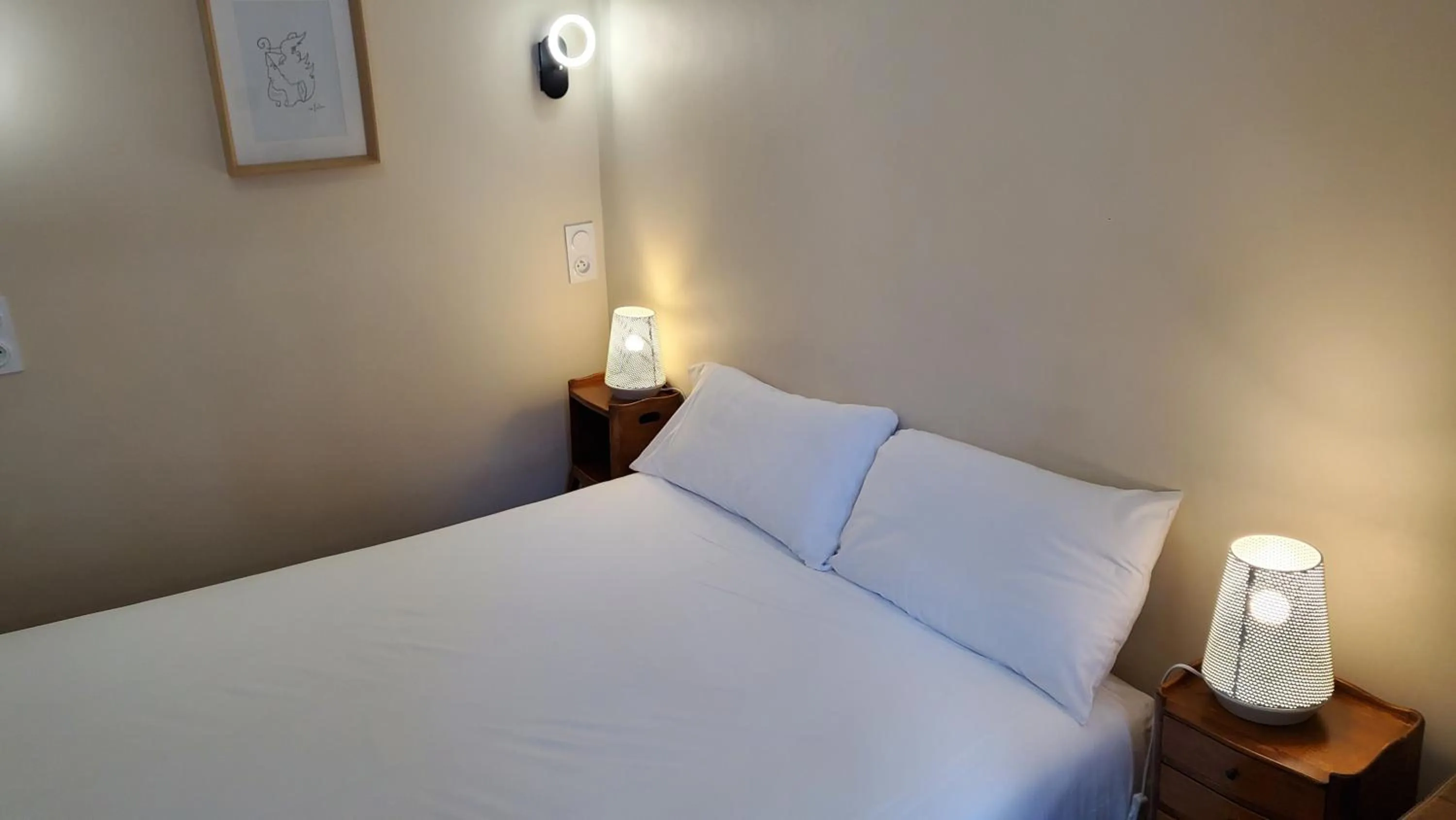 Bed in Grand Hôtel de la Poste