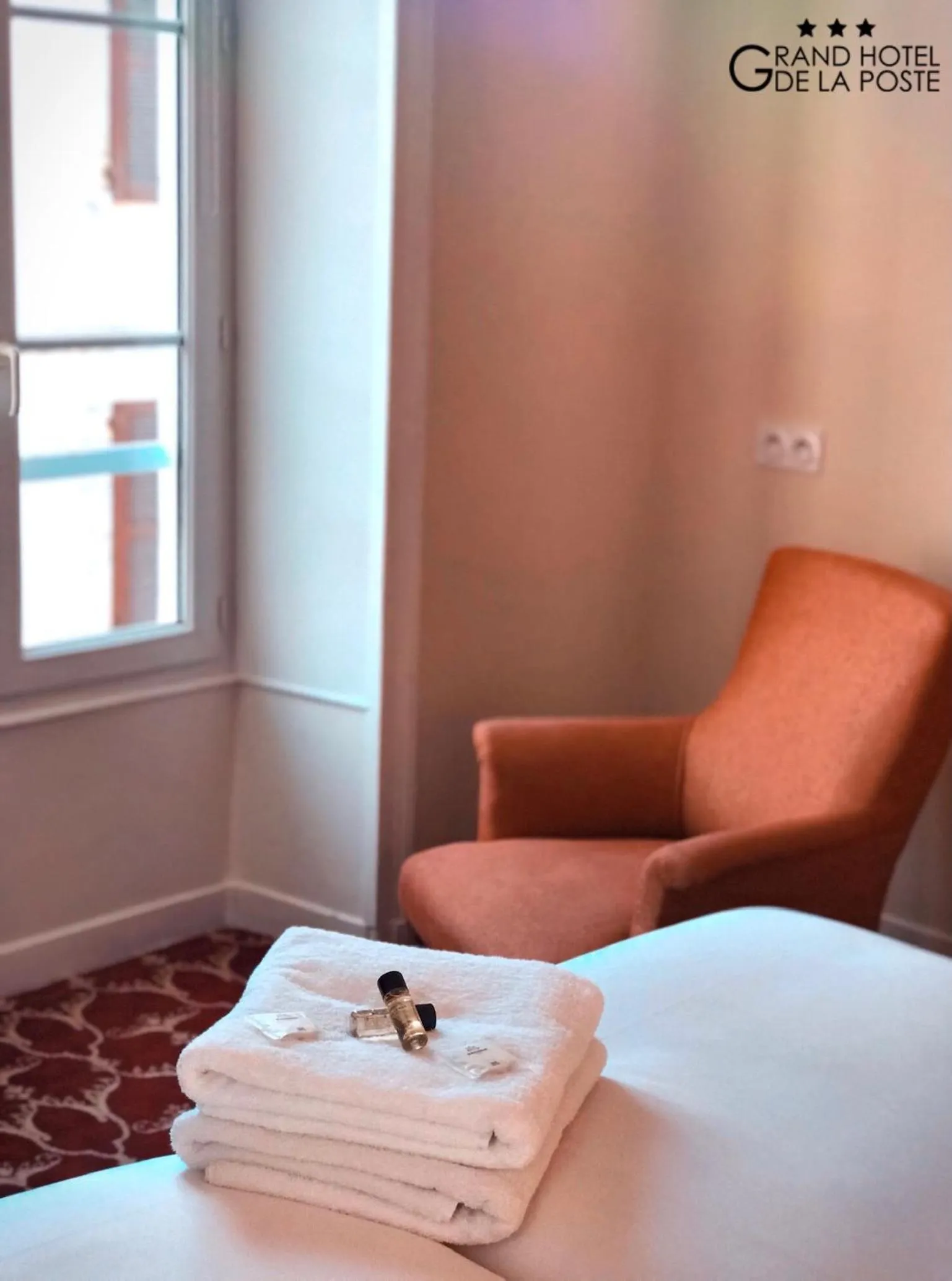 Bed in Grand Hôtel de la Poste