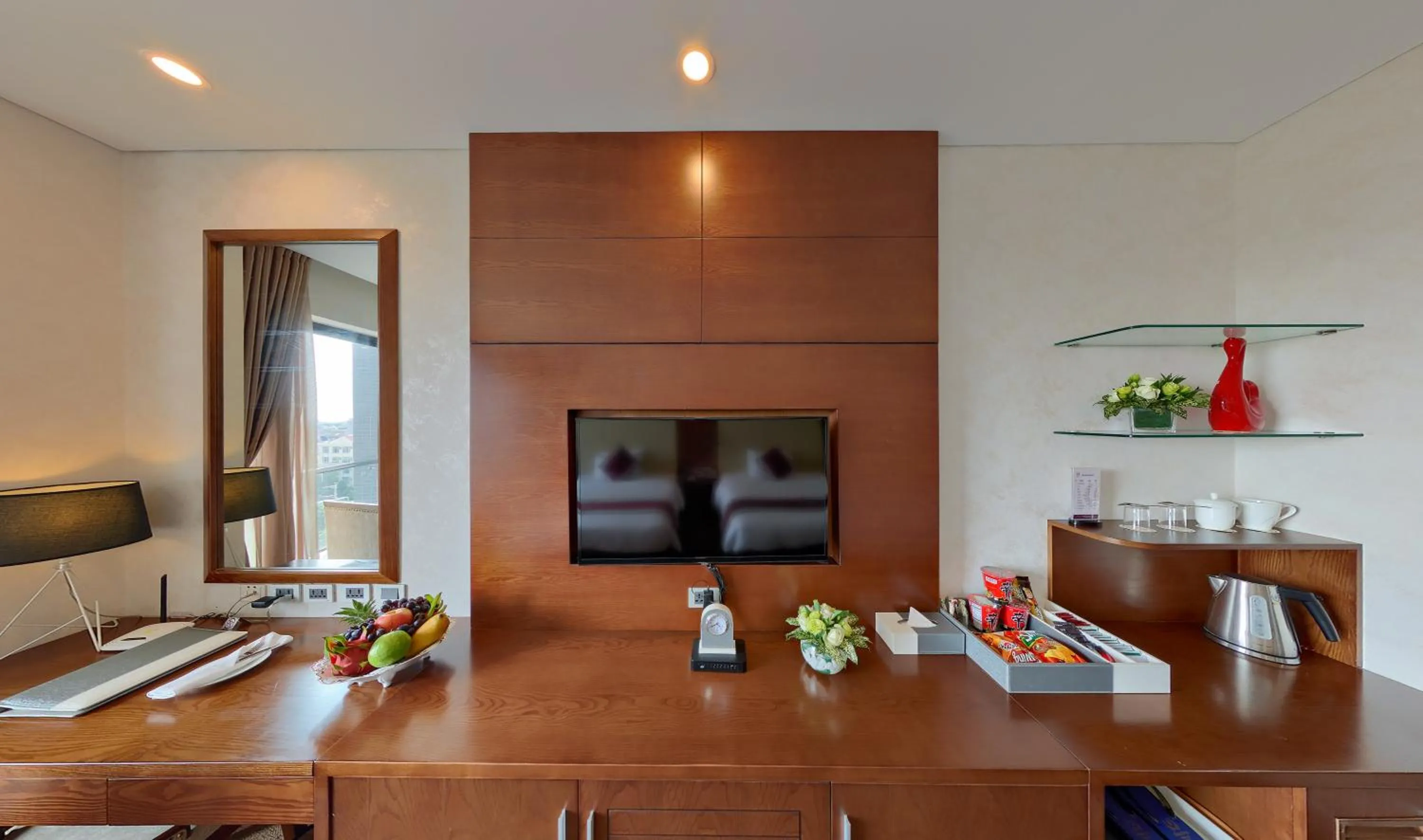 Communal lounge/ TV room in Le Indochina Hotel