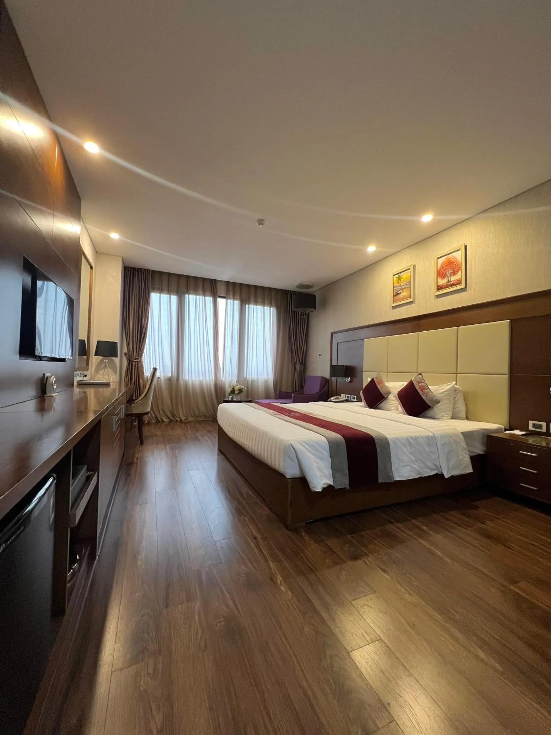 Bed in Le Indochina Hotel