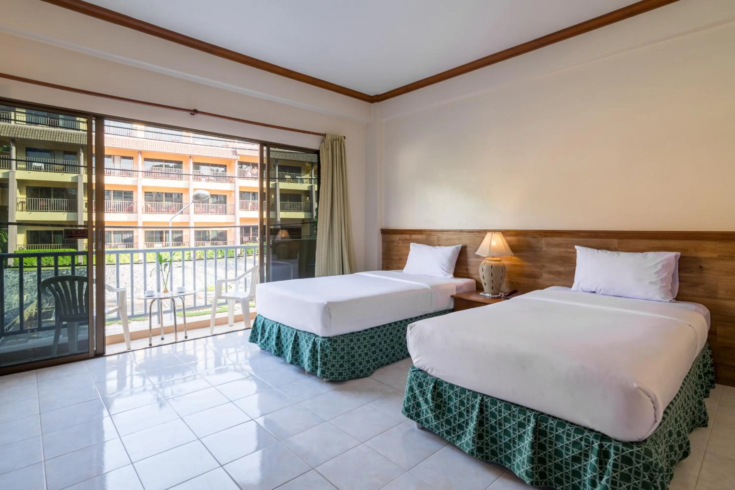 Bed in Kata Sun Beach Hotel