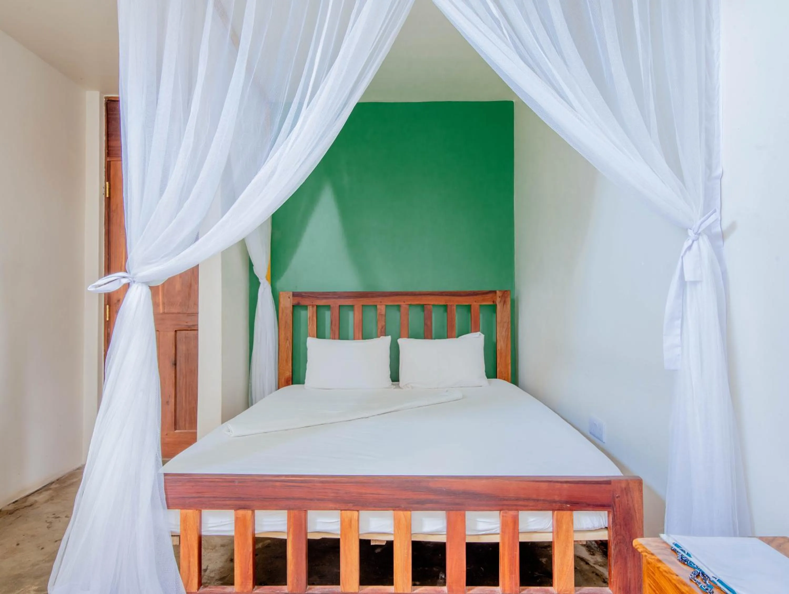 Bedroom in The Slow Leopard