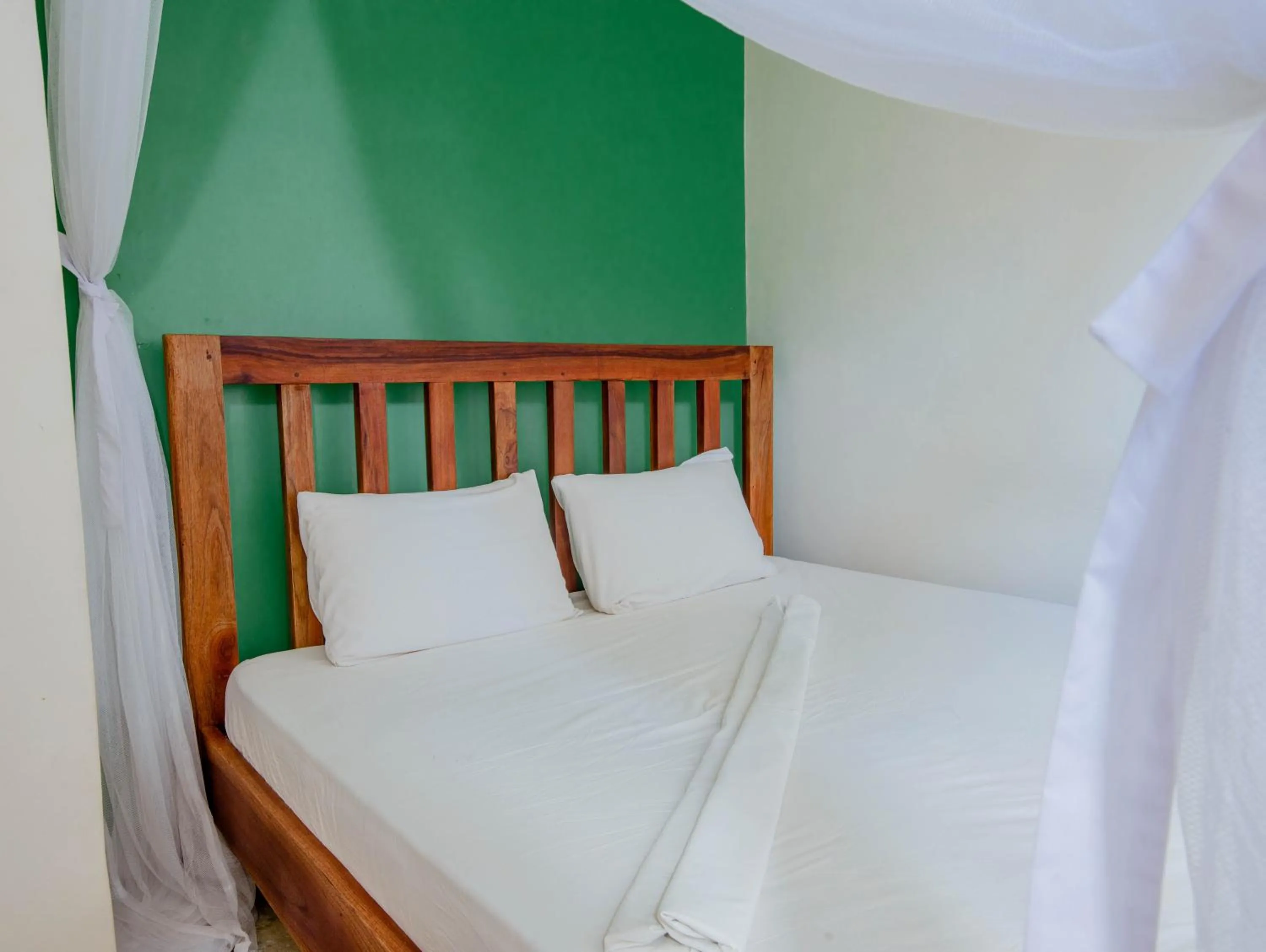 Bedroom in The Slow Leopard