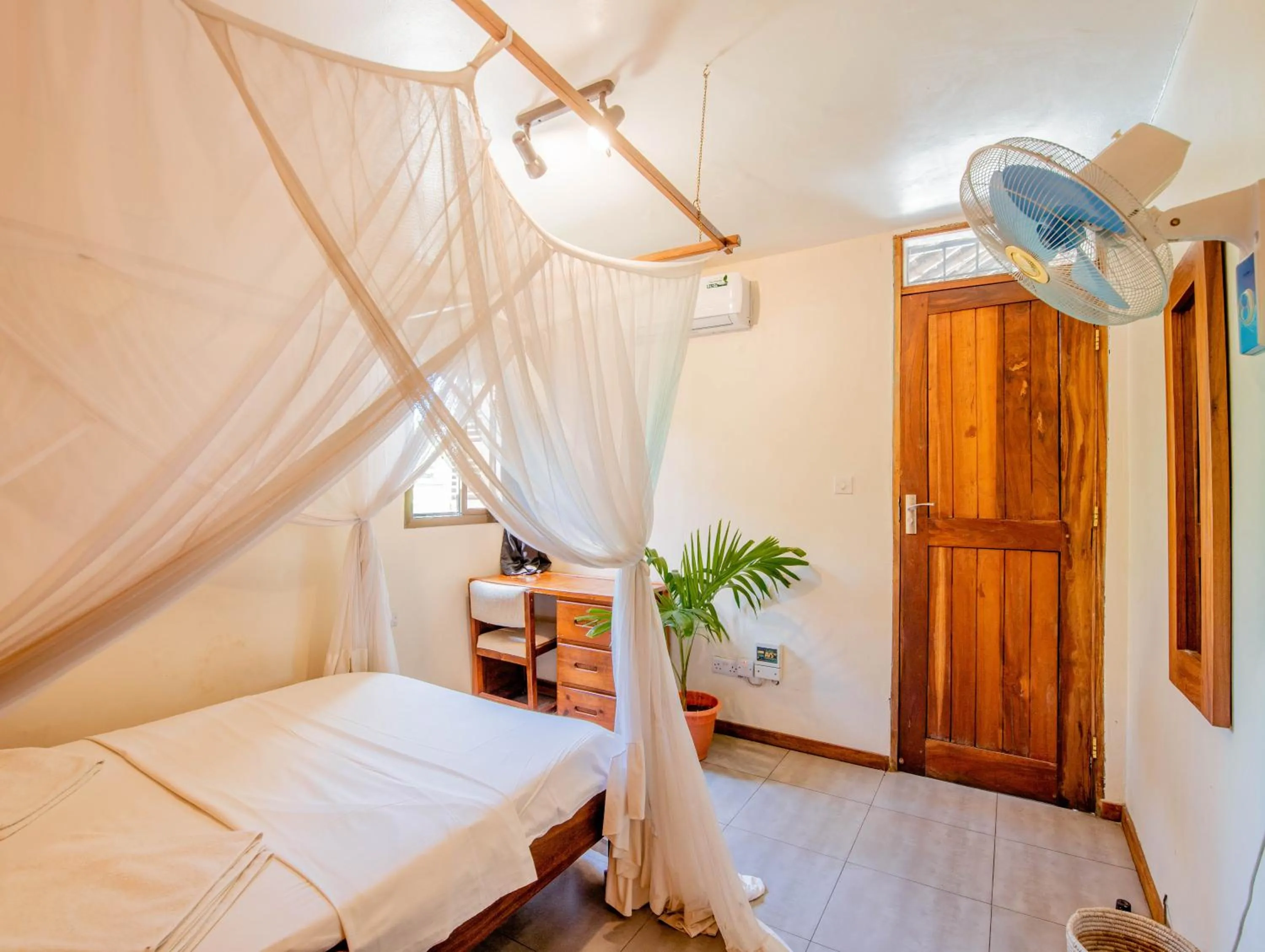 Bedroom in The Slow Leopard