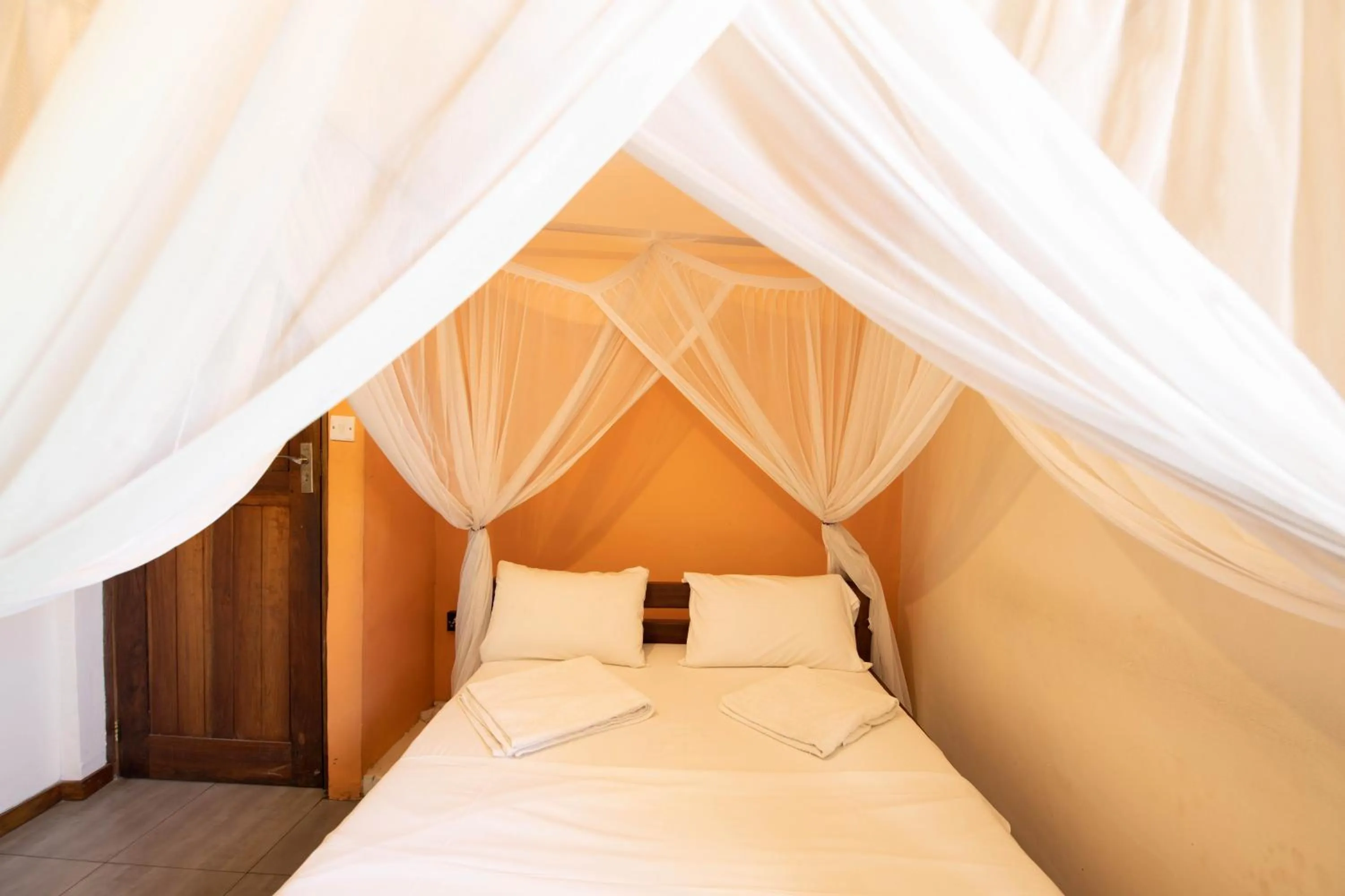 Bedroom in The Slow Leopard