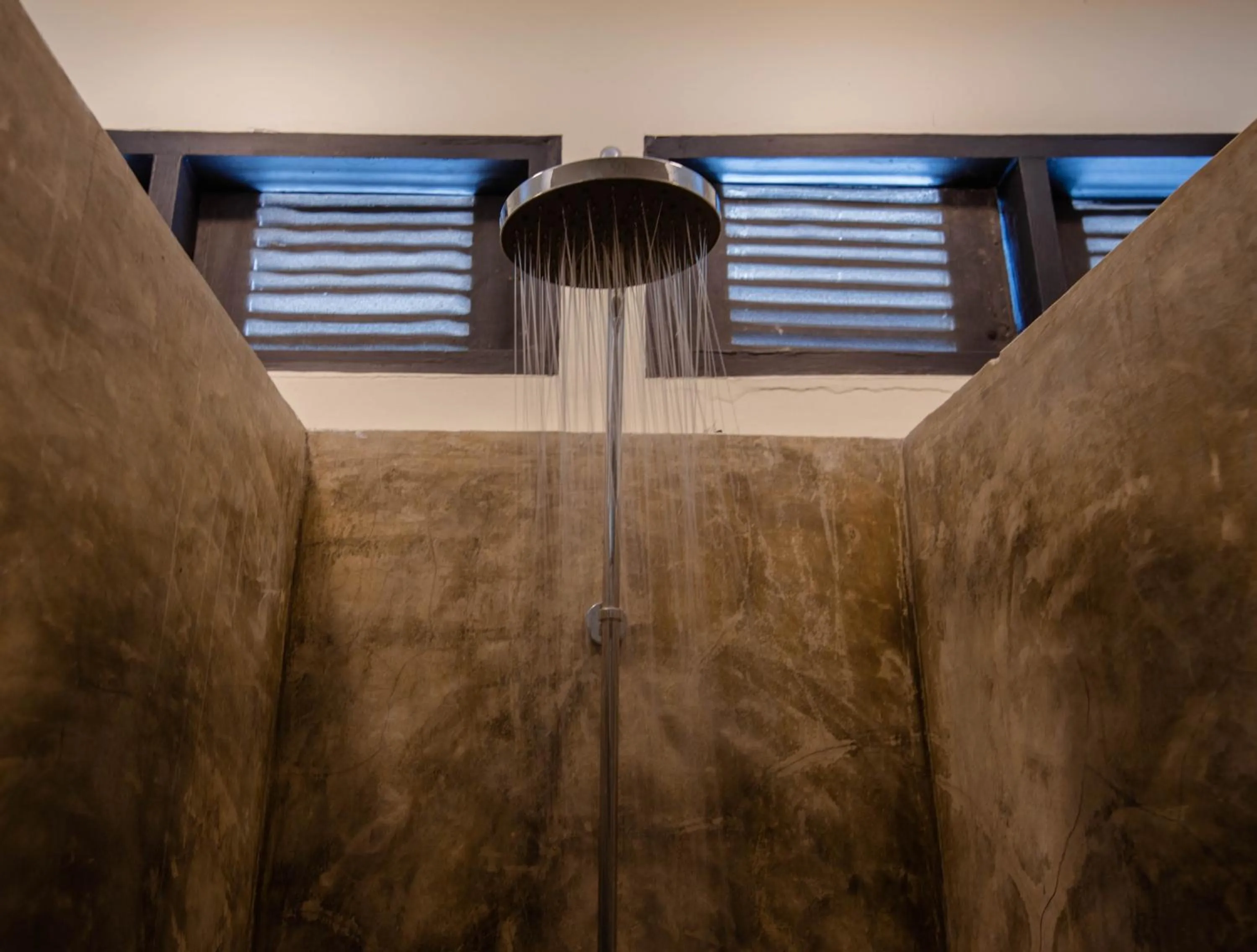 Shower in The Slow Leopard