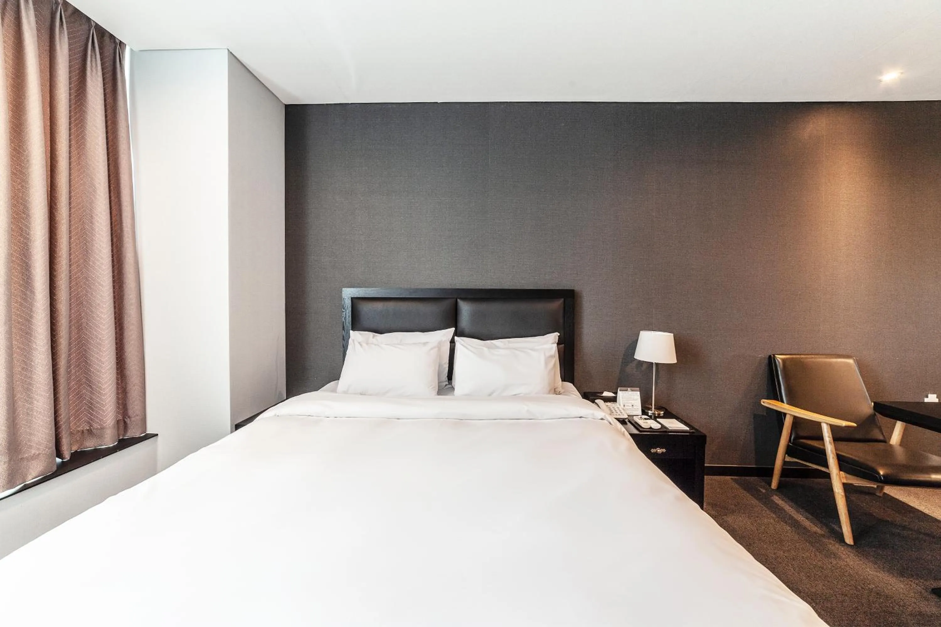 Bed in Gangneung Tourist Hotel