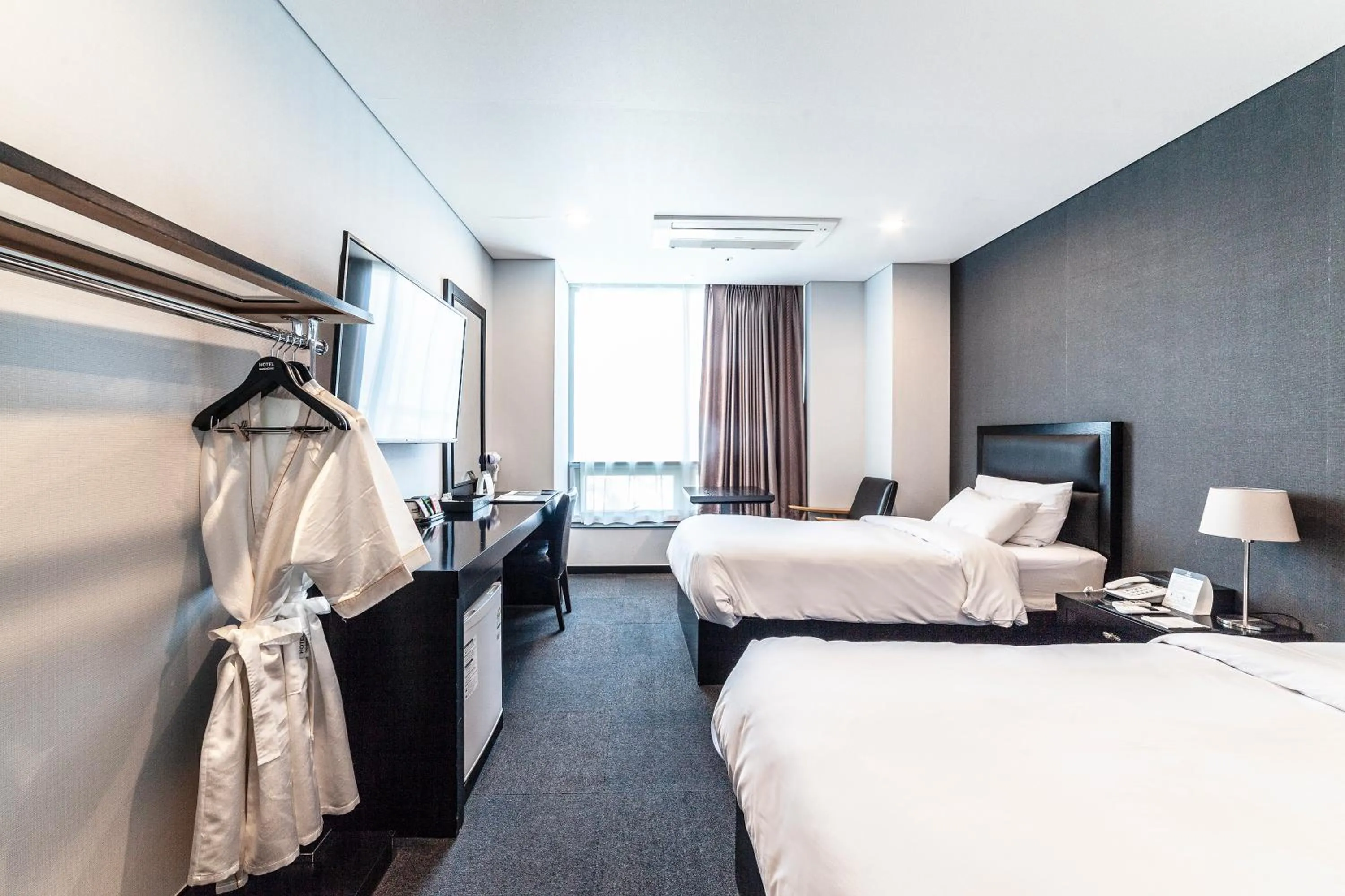 Bed in Gangneung Tourist Hotel