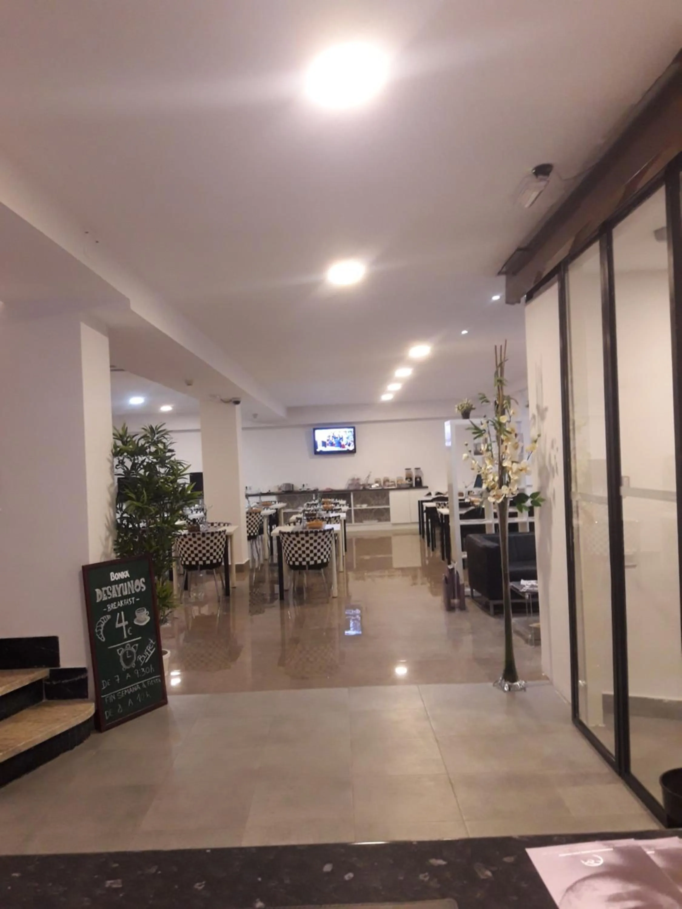 Communal lounge/ TV room in Nap Carta Puebla