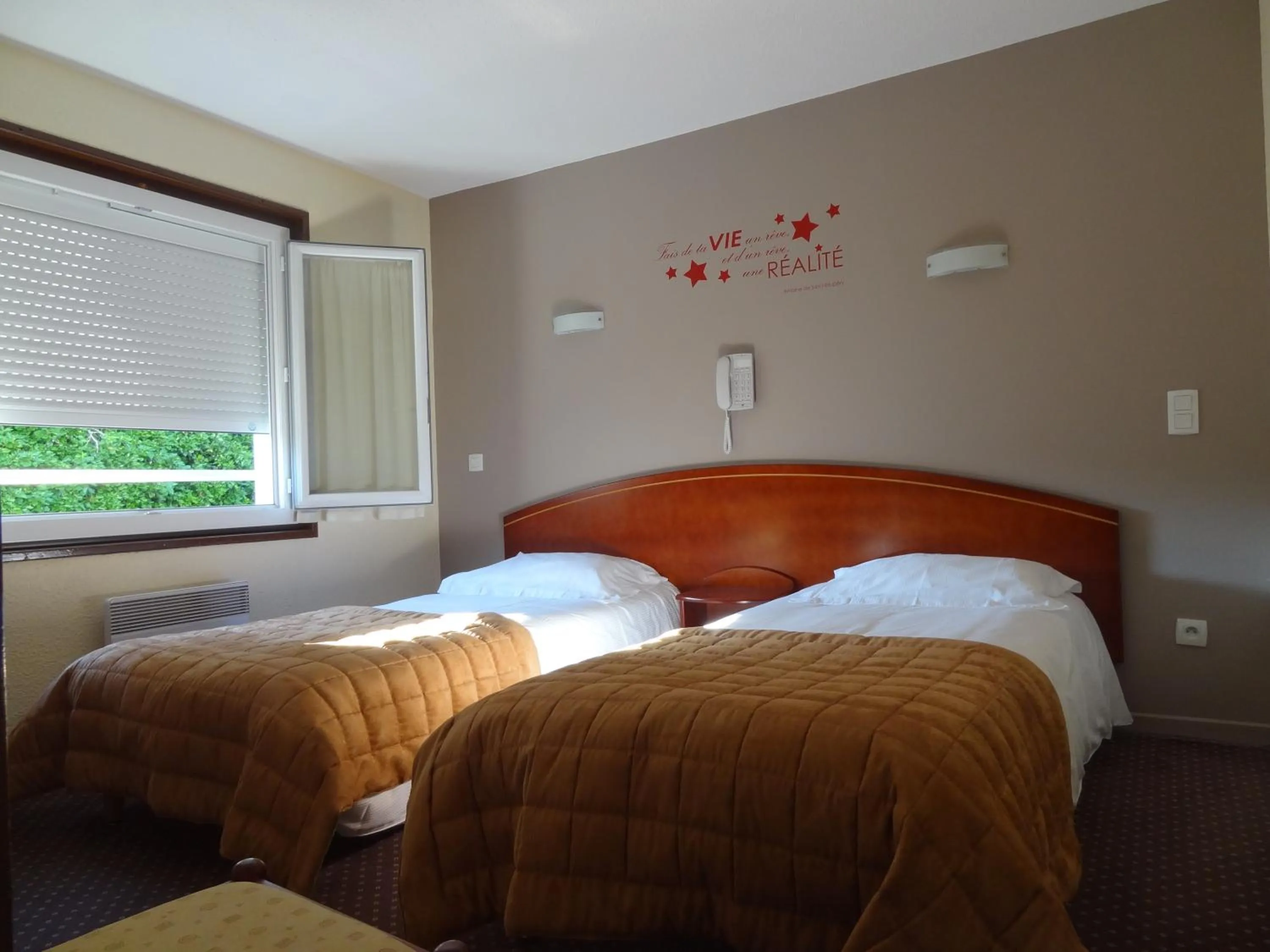 Photo of the whole room, Bed in Cit'Hotel de la Marne