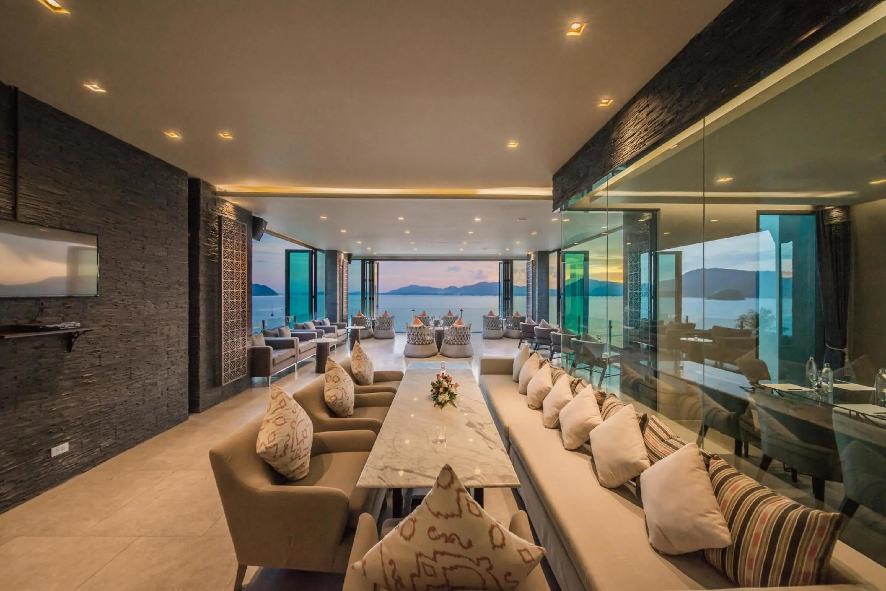 Communal lounge/ TV room in My Beach Resort Phuket, Panwa Beach