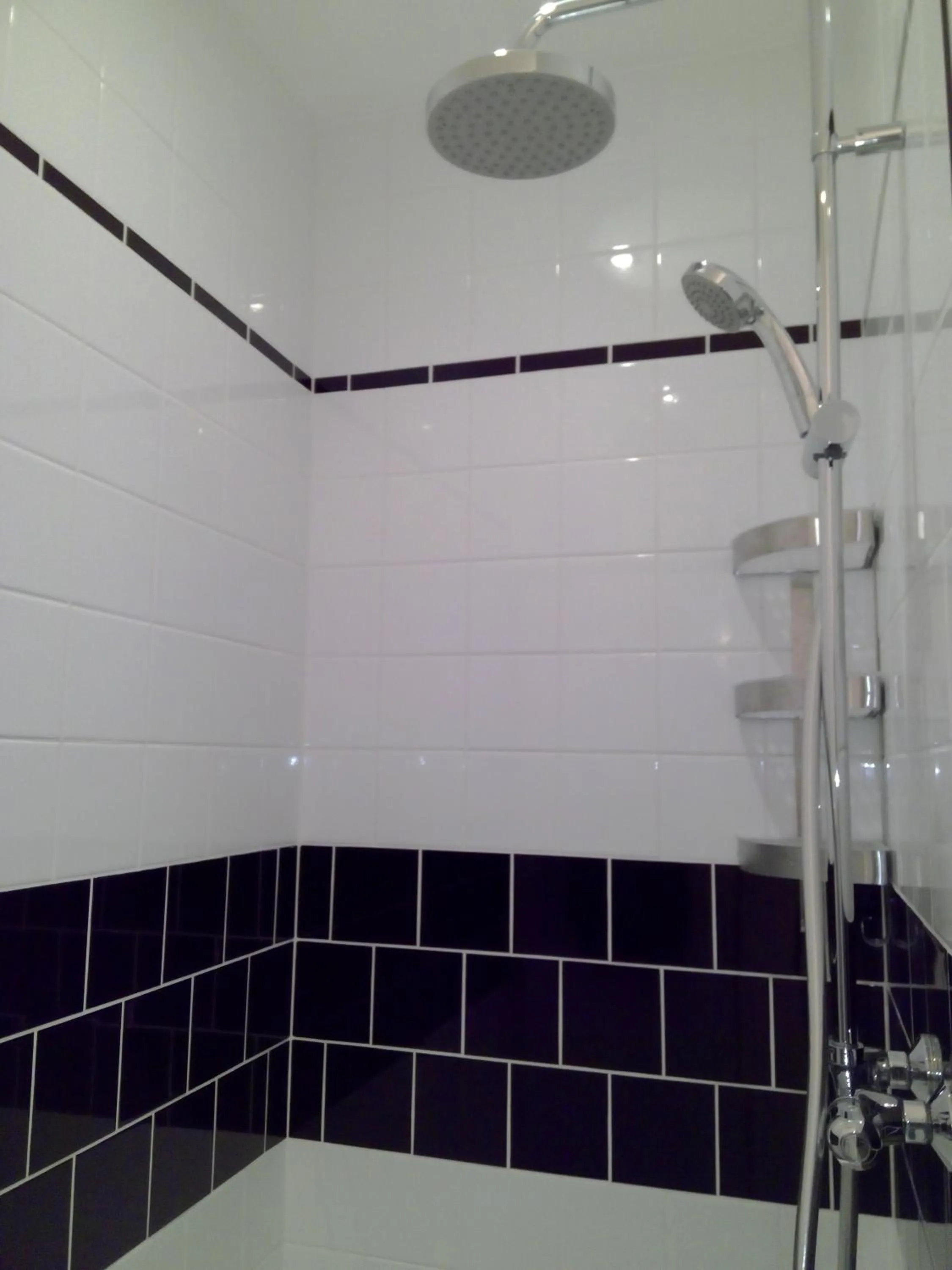 Bathroom in Appart'hôtel et chambres Lens