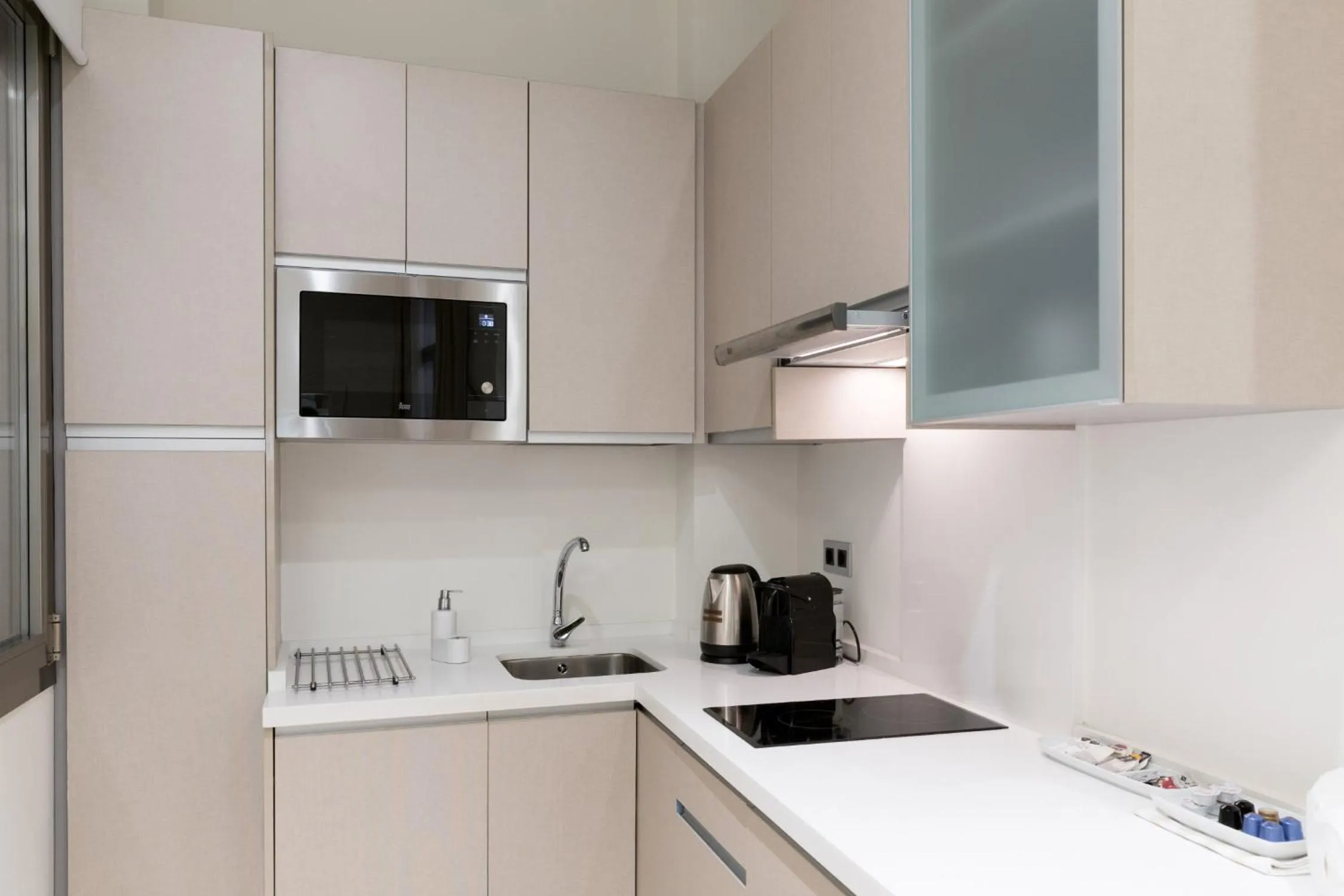Kitchen or kitchenette in Welldone Cathedral Suites
