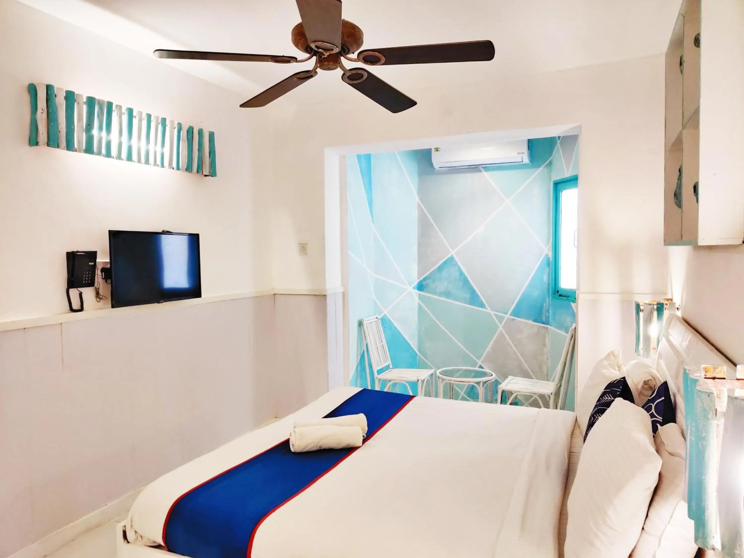 Bed in Eros Boutique Hotel