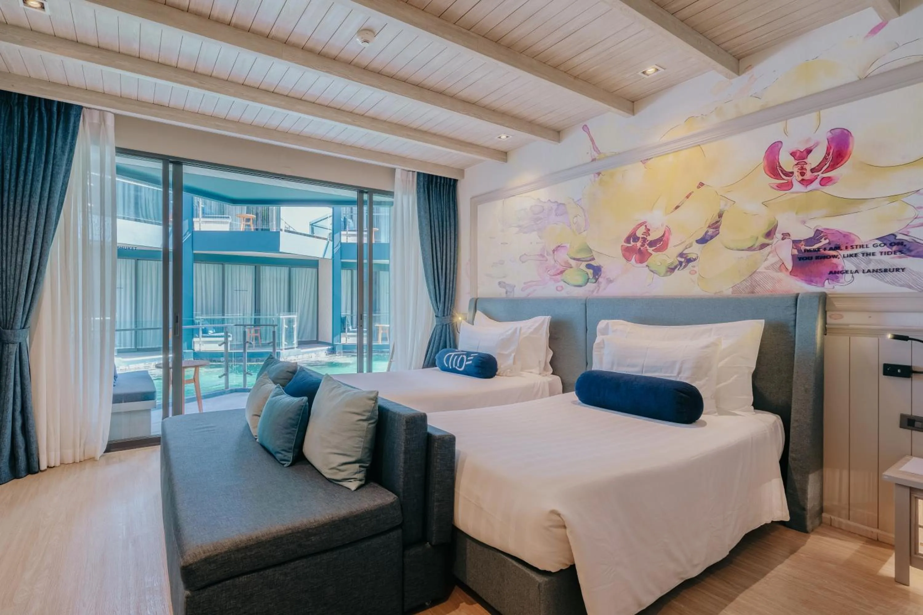 Bed in Hotel Tide Phuket Beachfront