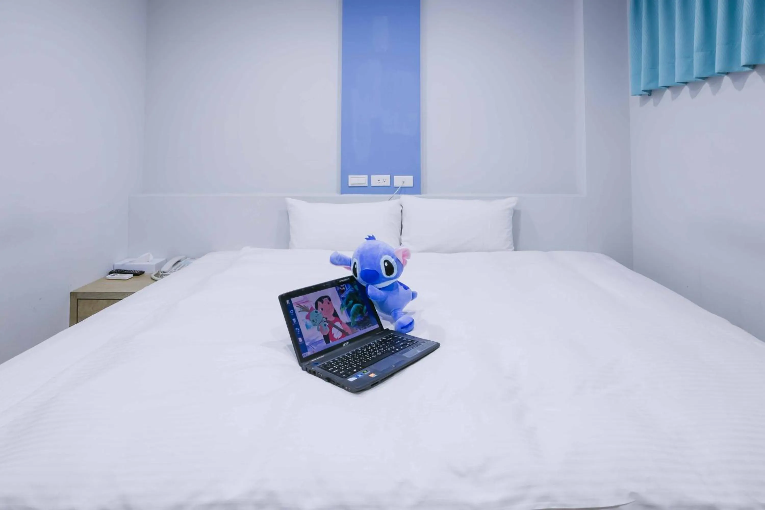 Bed in Mei Ti Fashion Hotel