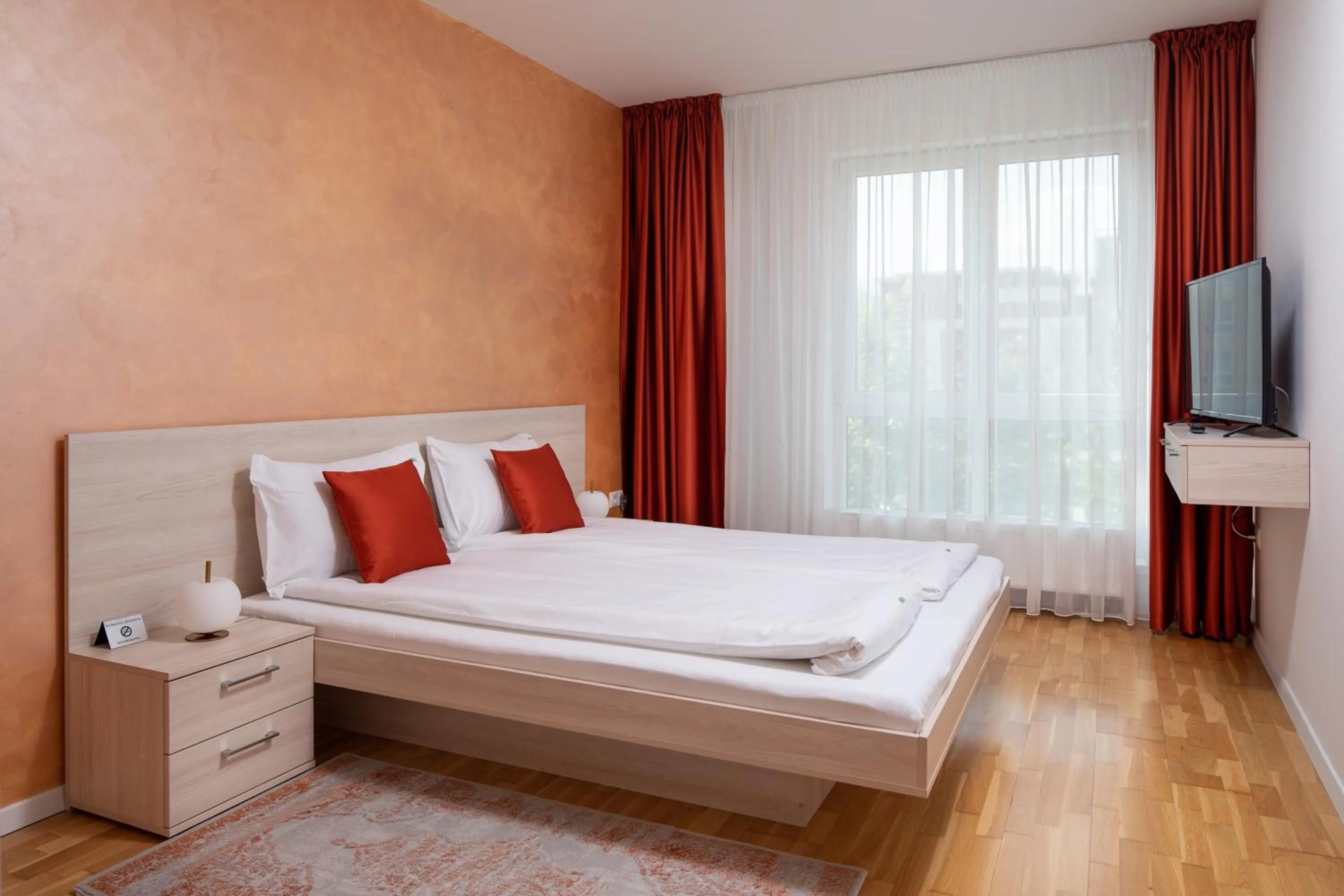 Bed in Brasov Holiday Apartments