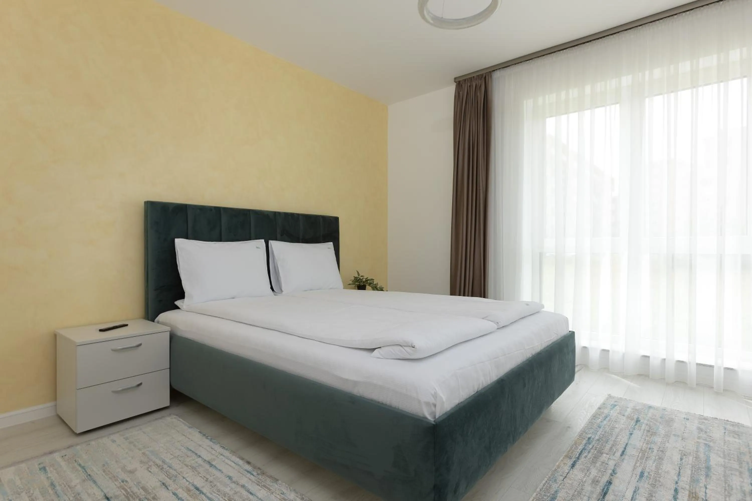 Bed in Brasov Holiday Apartments