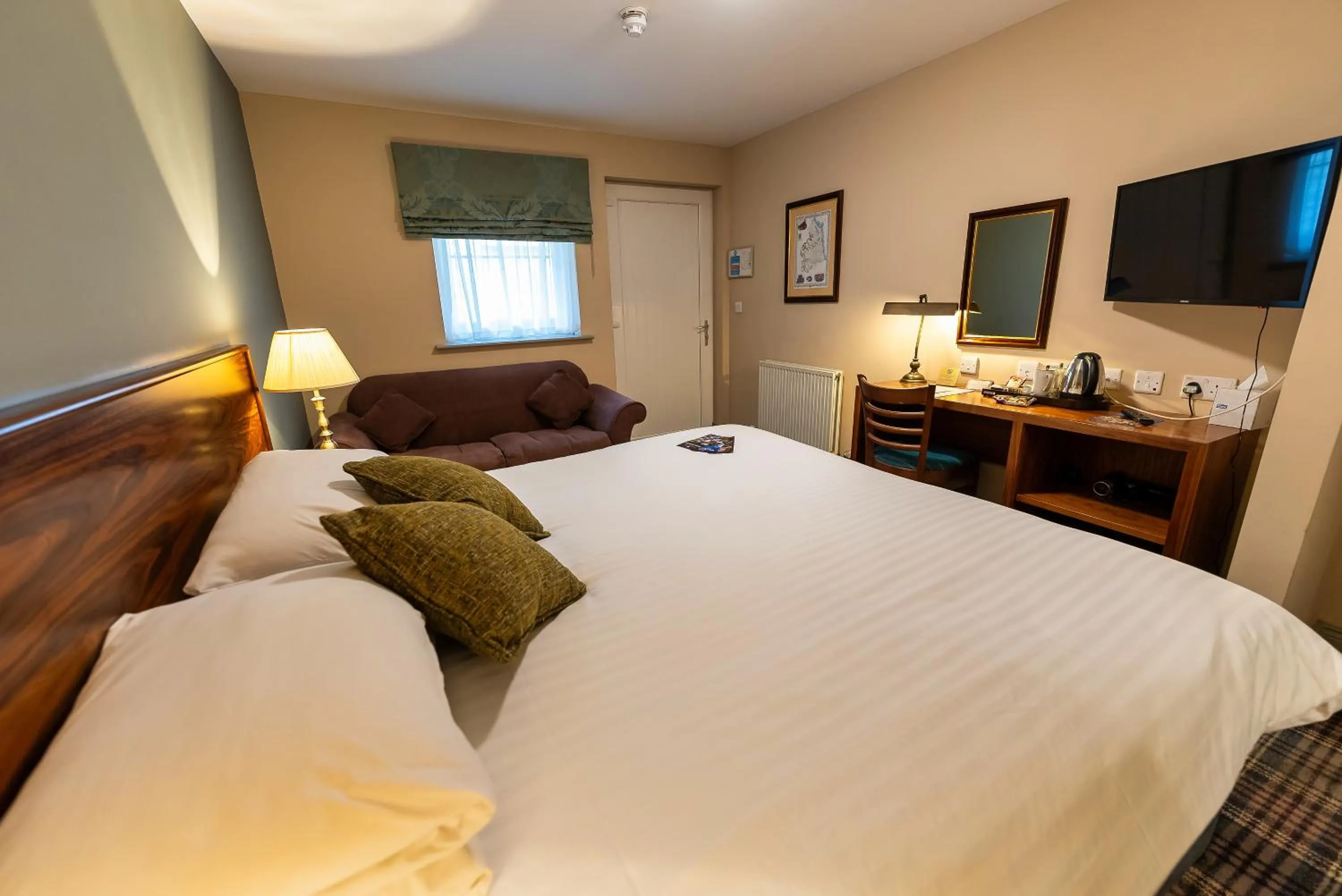 Bed in The Lindisfarne Inn - The Inn Collection Group