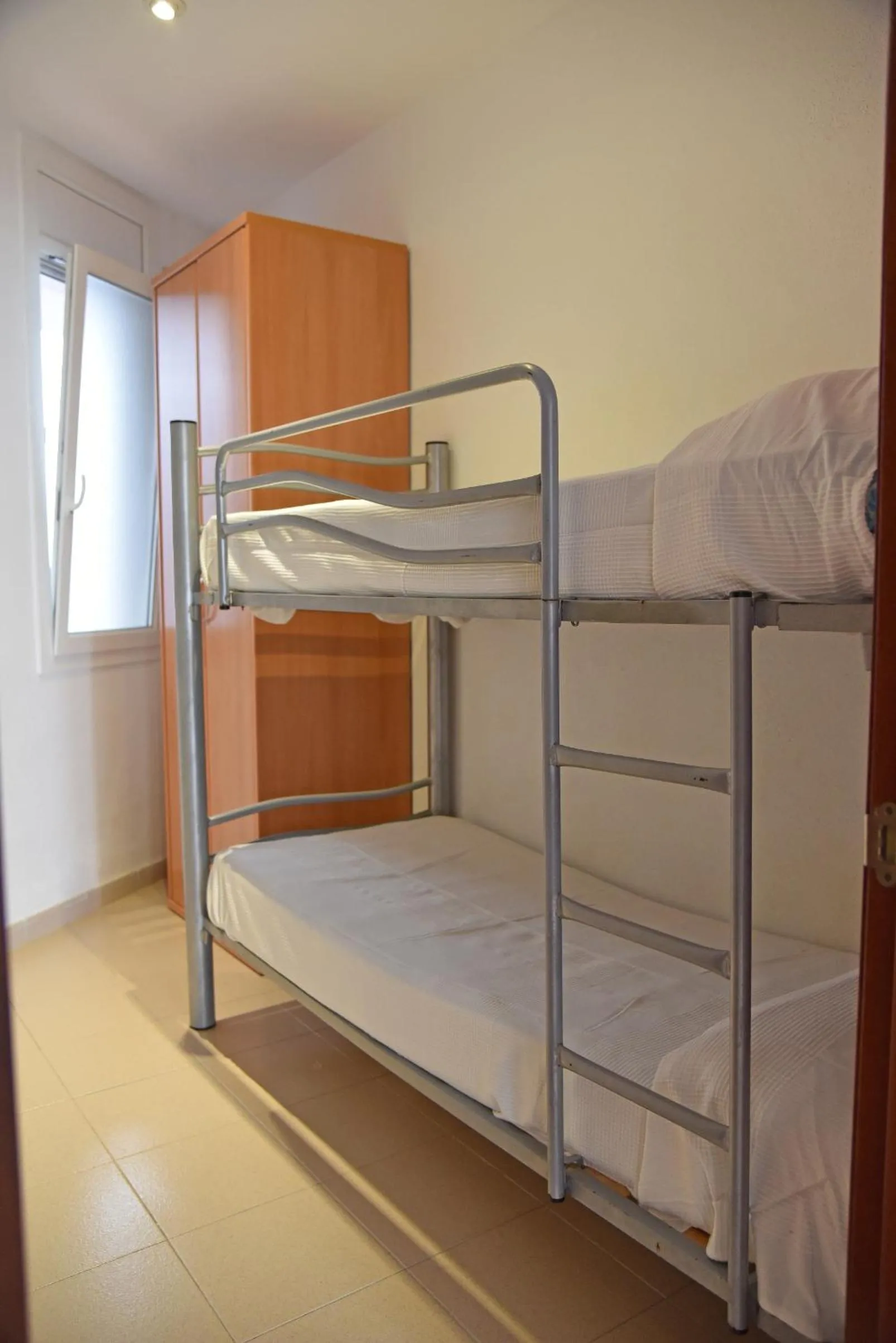 Bedroom, Bed in Apartamentos AR Dosjoimi