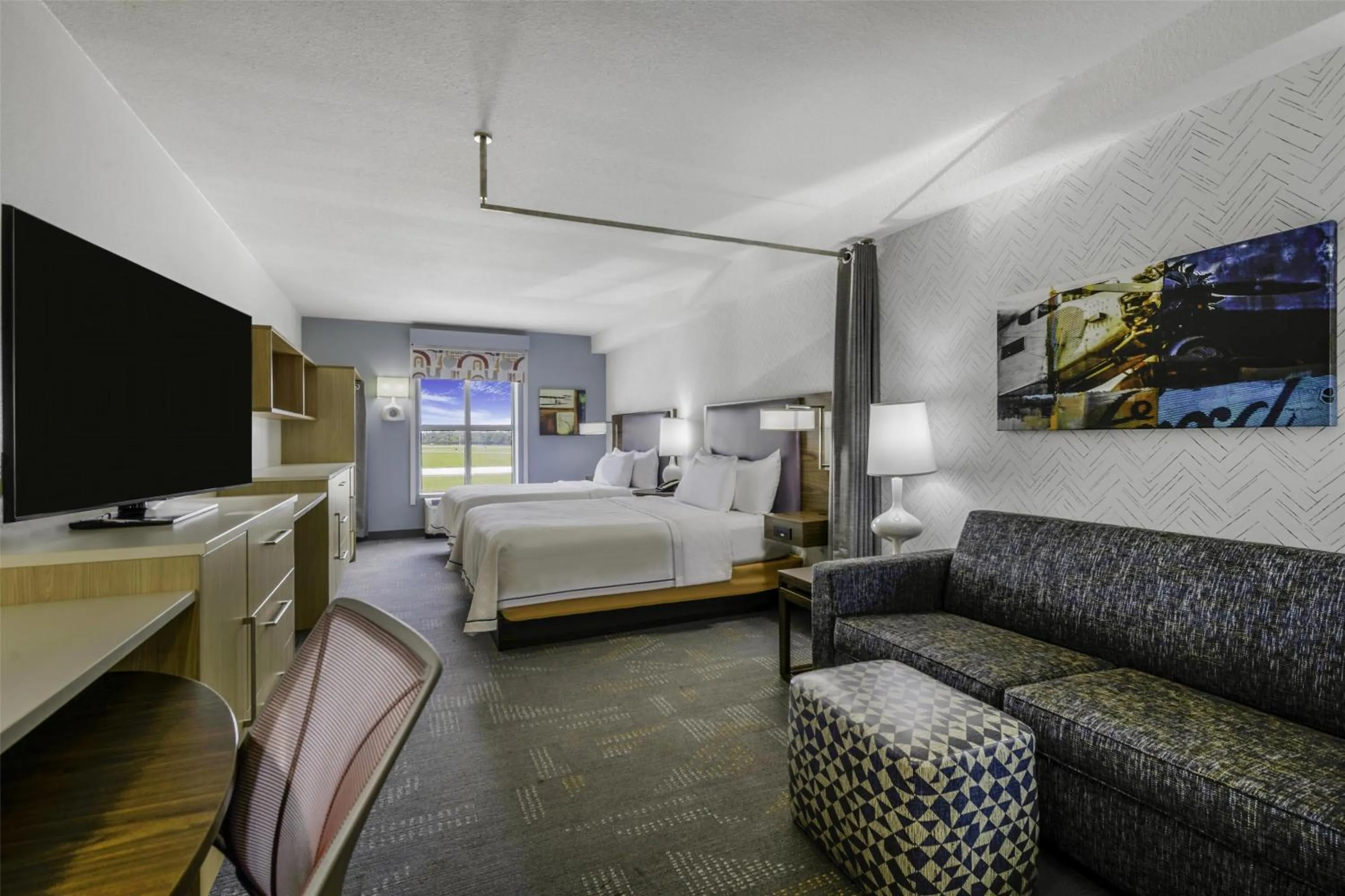 Living room, Bed in Home2 Suites By Hilton St. Simons Island