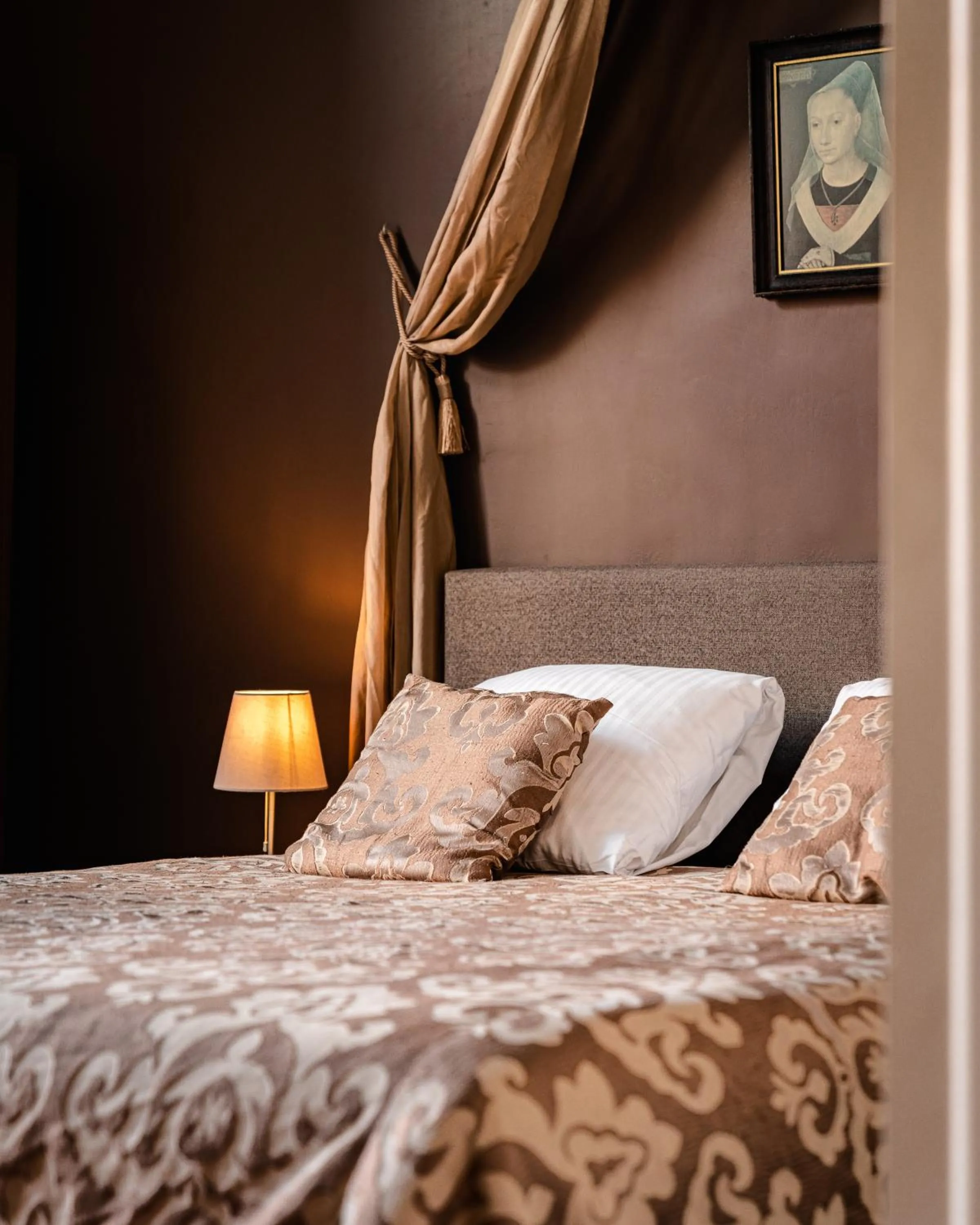 Bed in Hotel Van Eyck