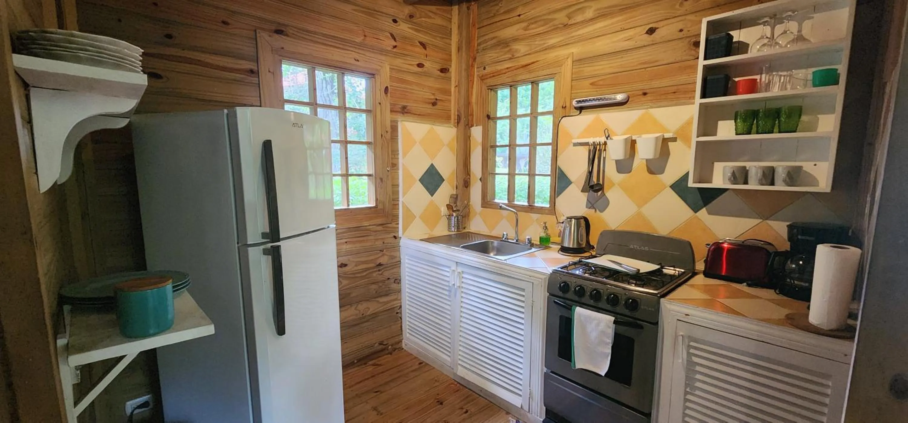 Kitchen or kitchenette in Boutique Hotel y Spa Tangara Azul