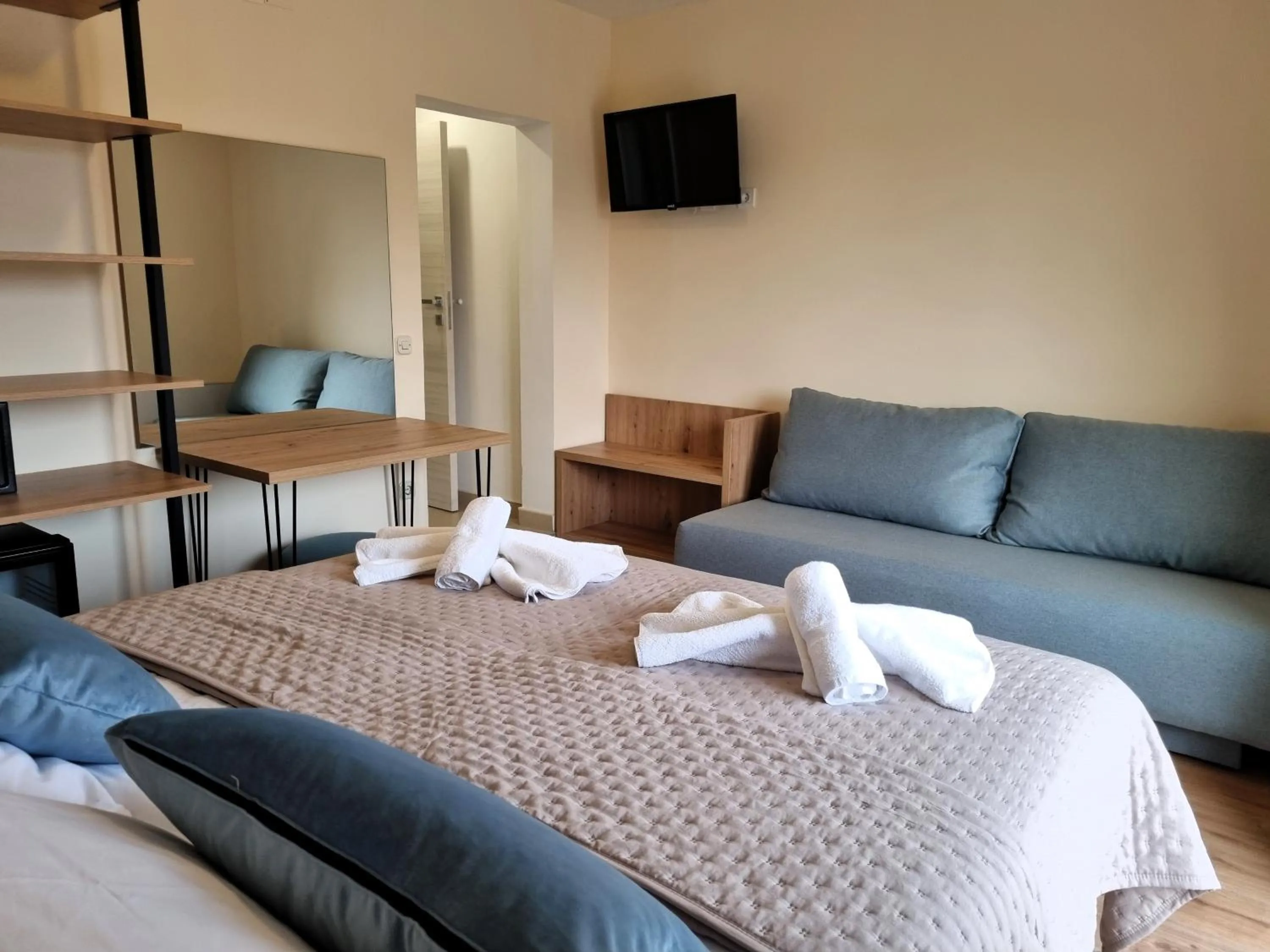 Seating area, Bed in Villa Daniela