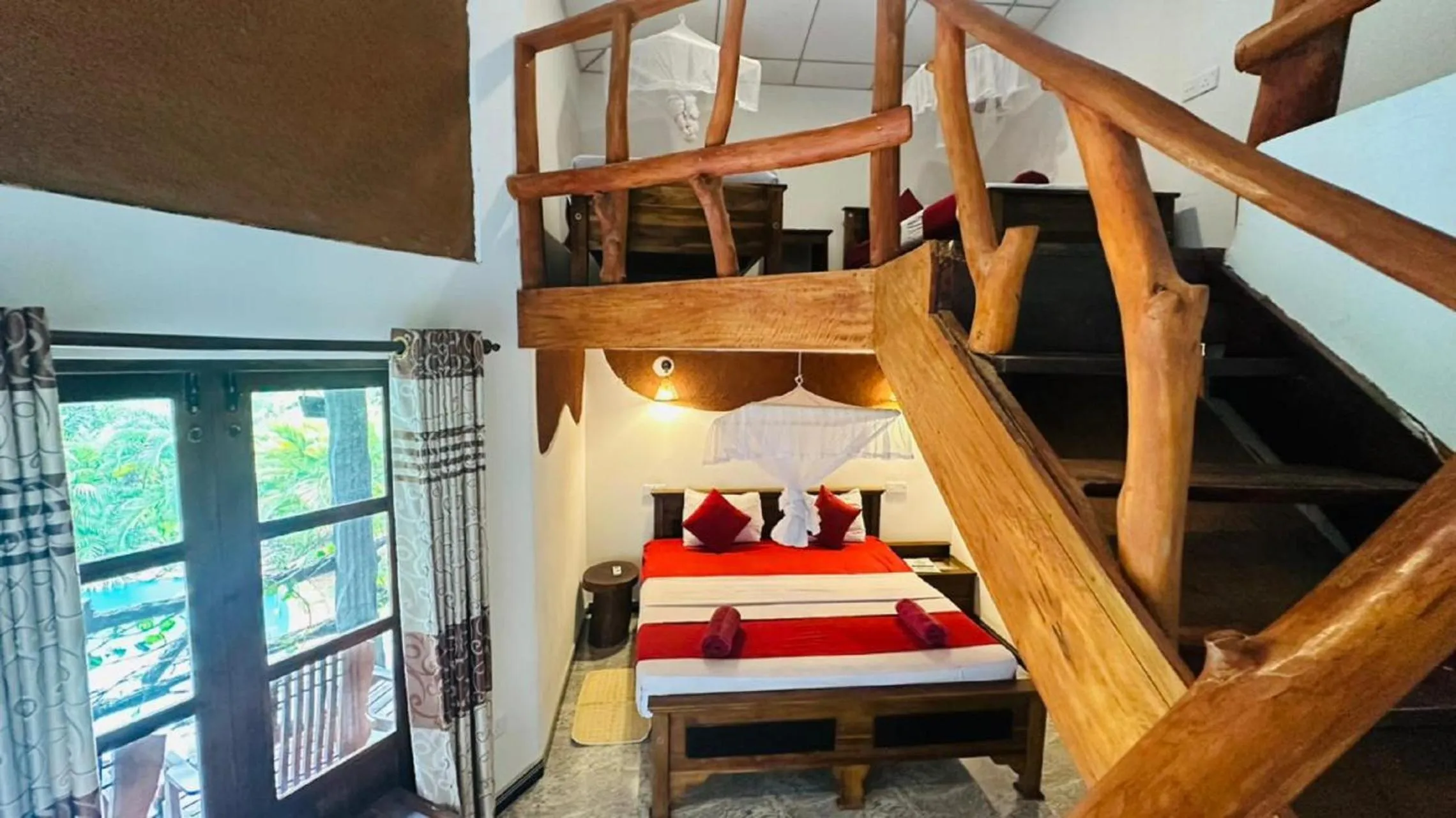 Bed in Sigiri Heritage Villa