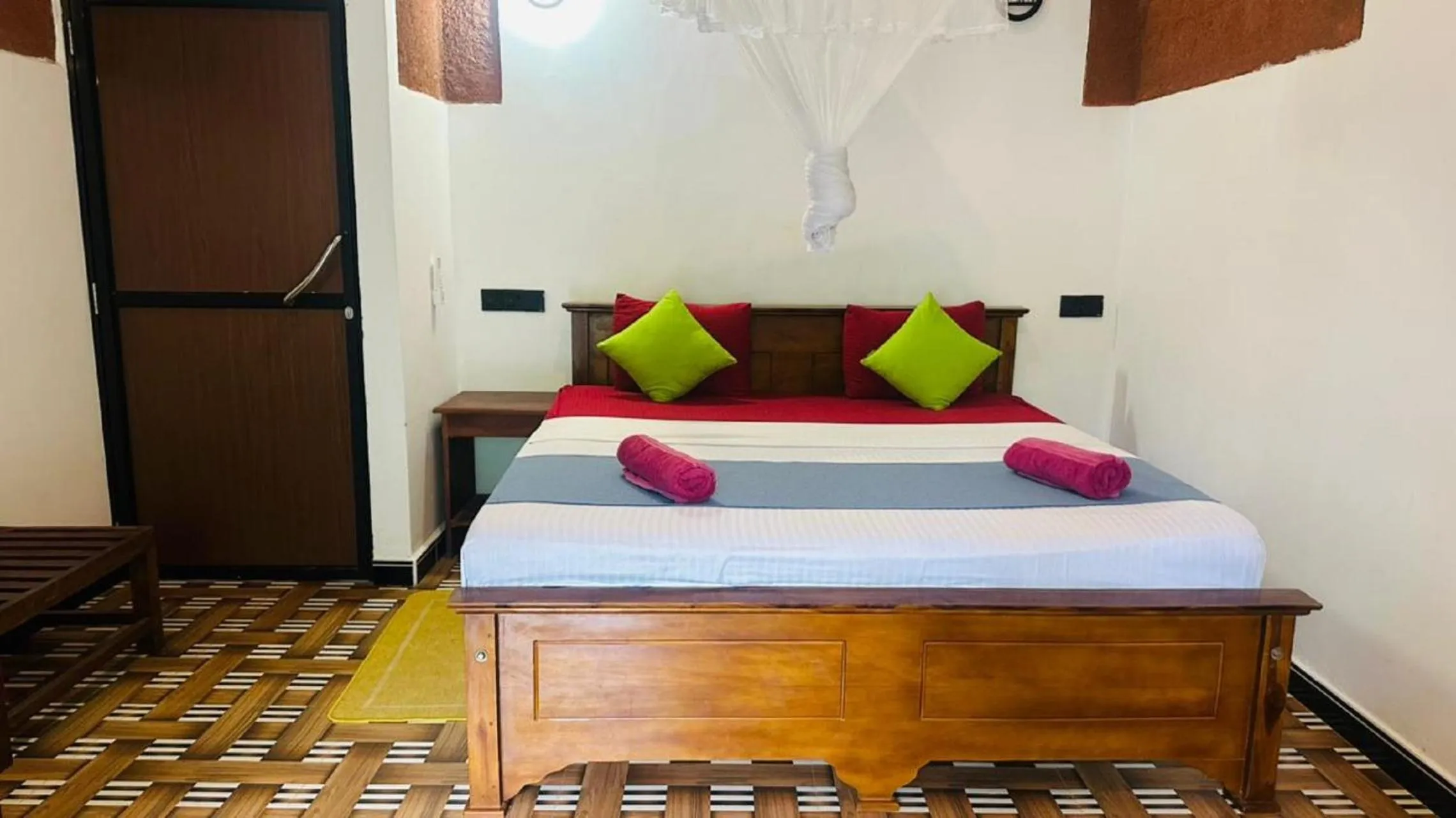 Bed in Sigiri Heritage Villa