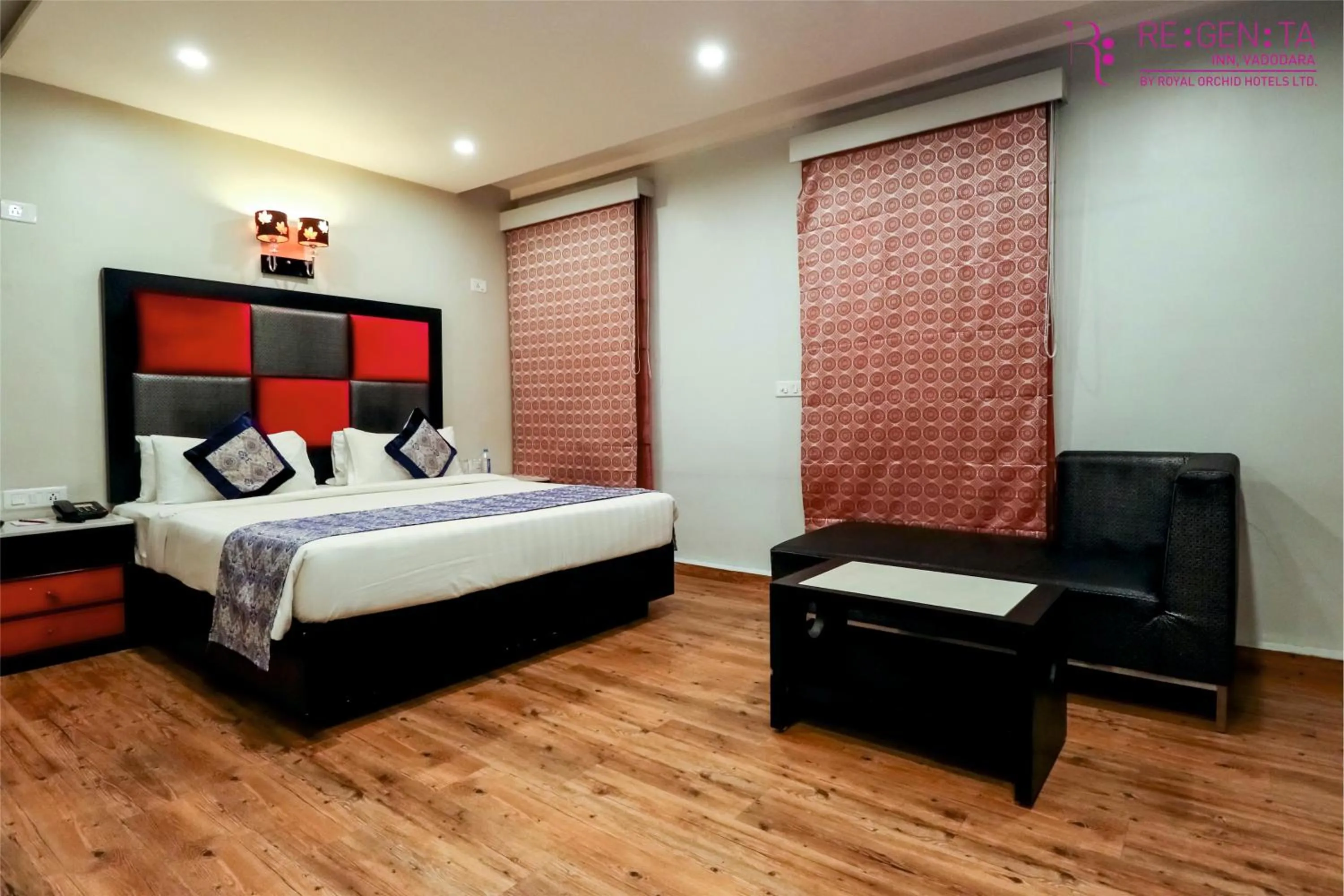 Photo of the whole room, Bed in Regenta Inn Vadodara, 500m from Railway Station