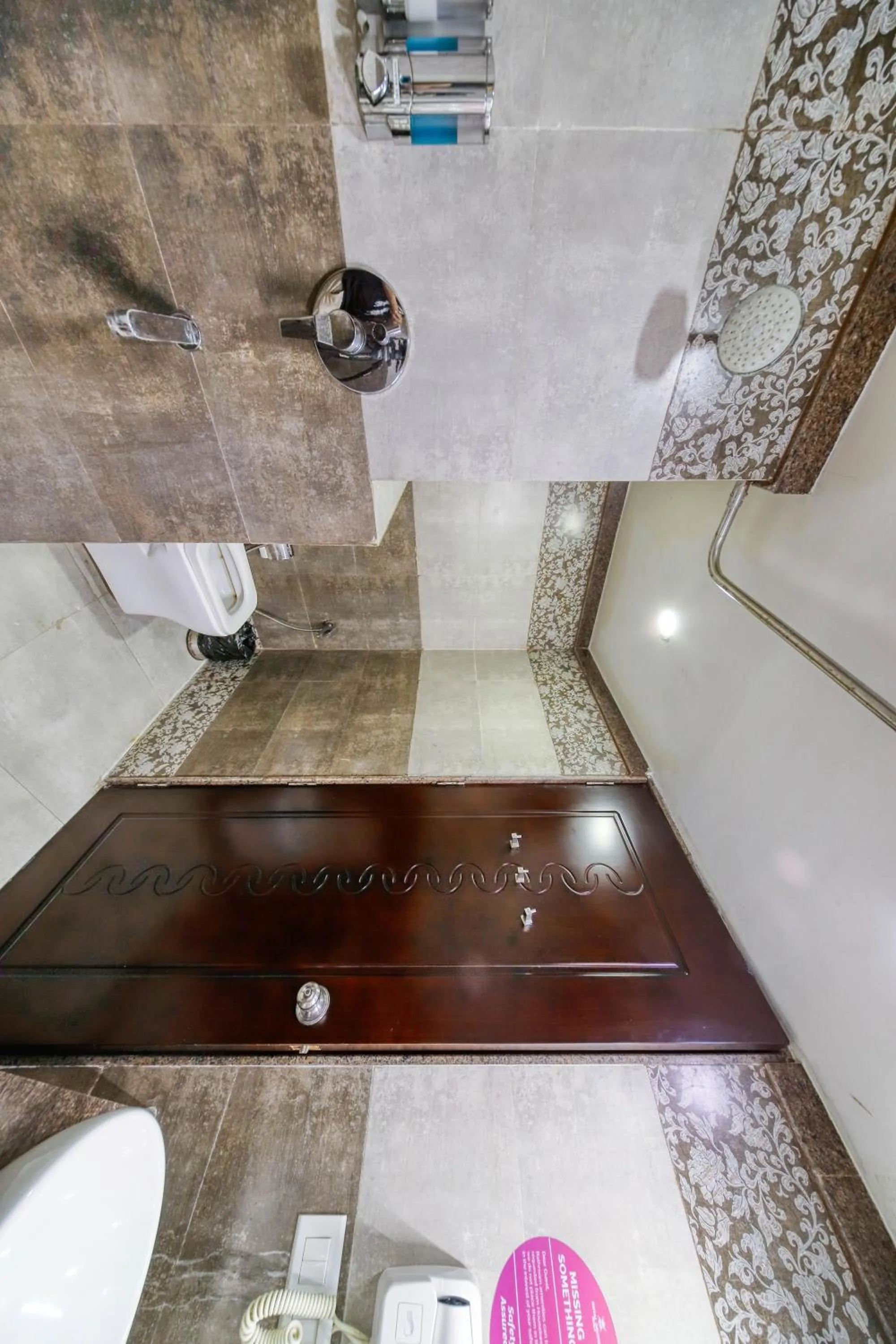 Bathroom in Regenta Inn Vadodara, 500m from Railway Station