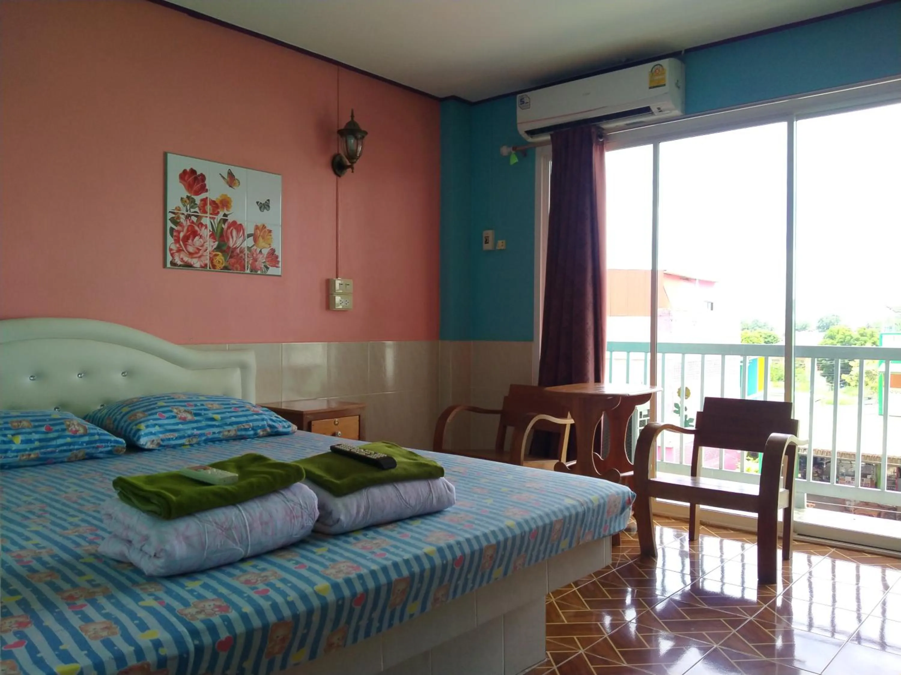 Bed in Rueangsrisiri Guesthouse 2