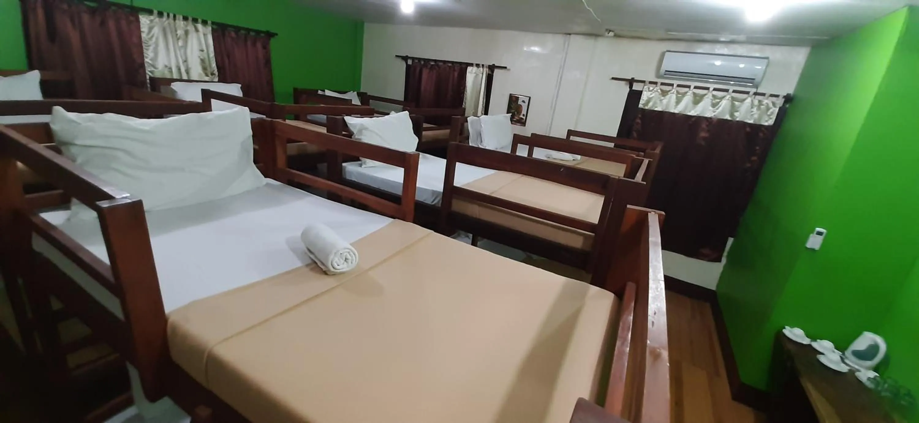 Bed in Escolta's Homey Lodge