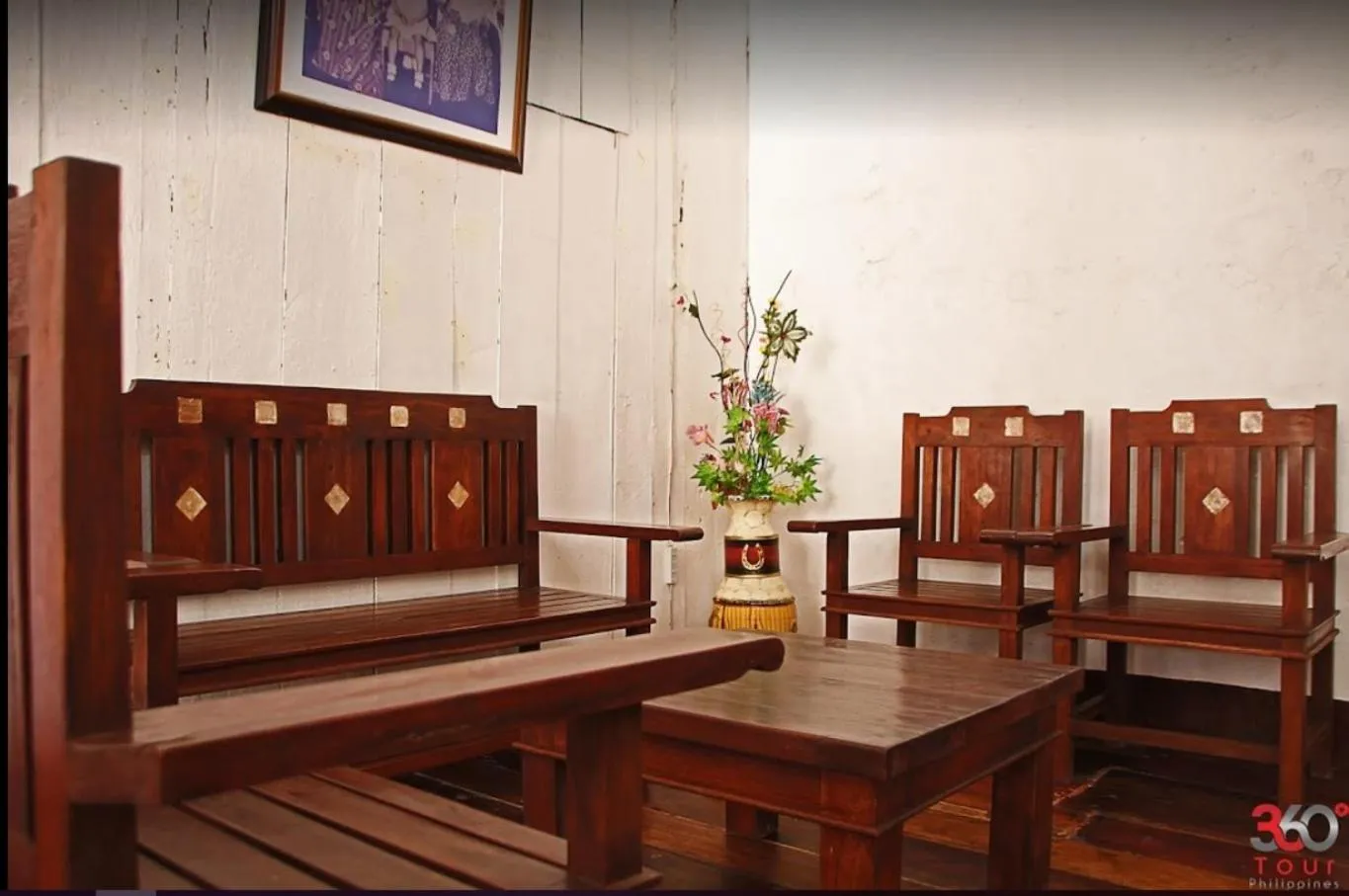 Communal lounge/ TV room in Escolta's Homey Lodge