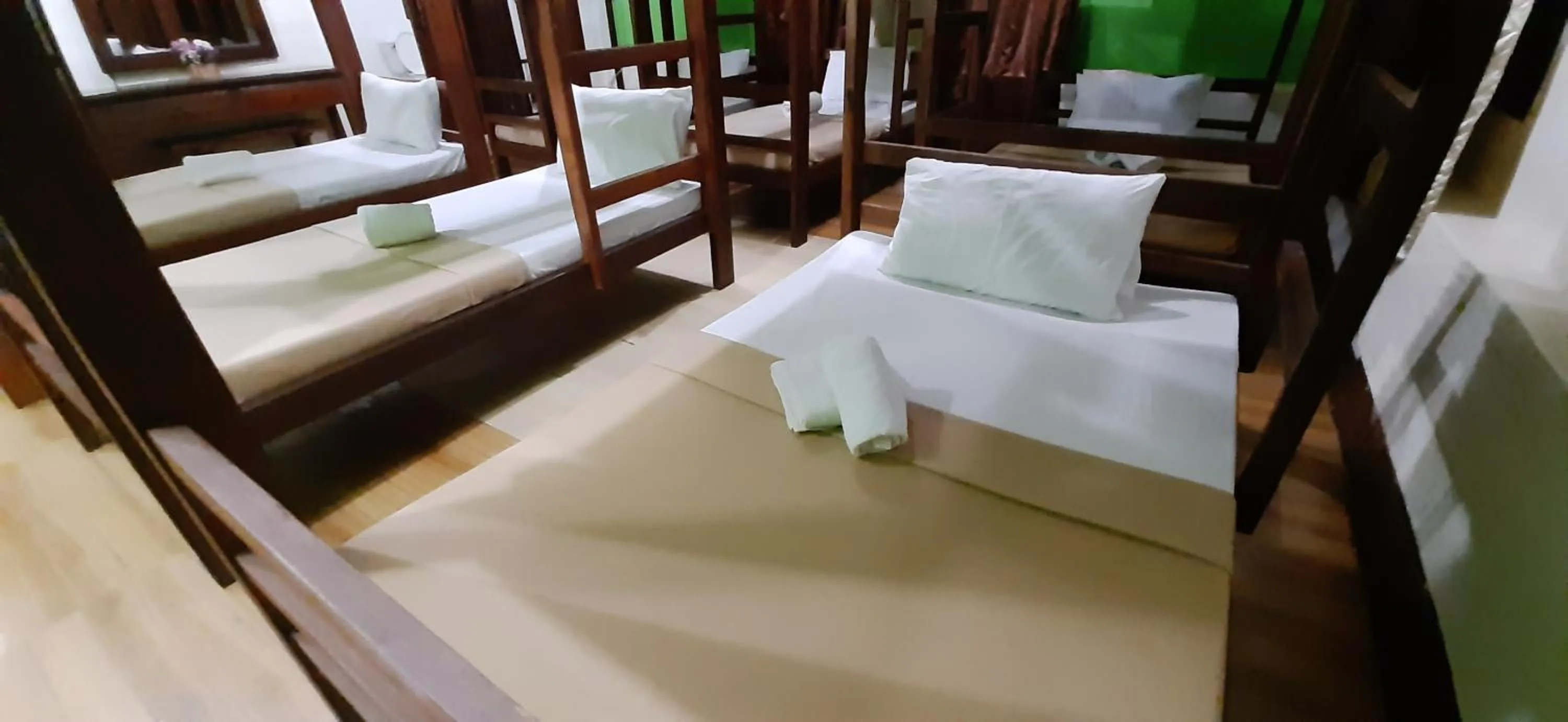 Bed in Escolta's Homey Lodge