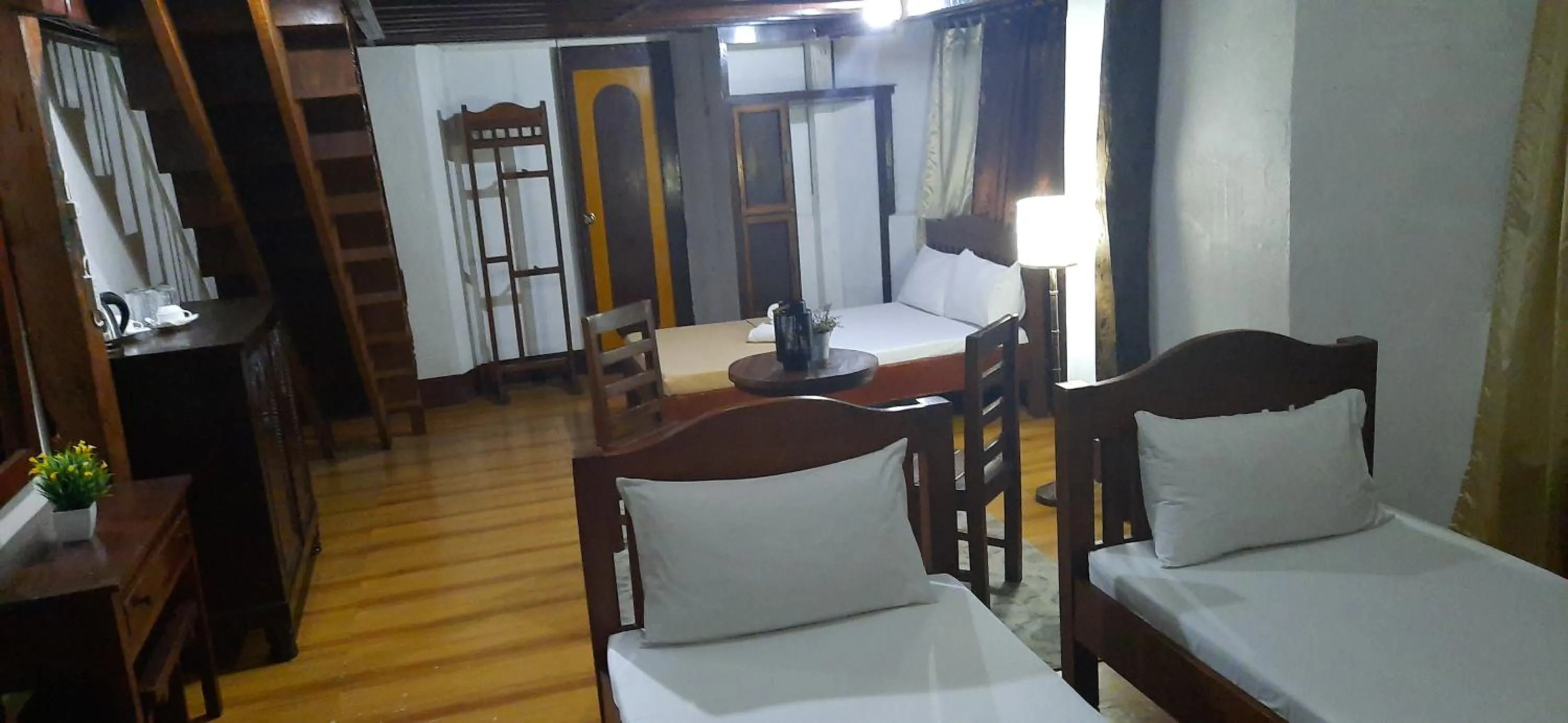 Bed in Escolta's Homey Lodge