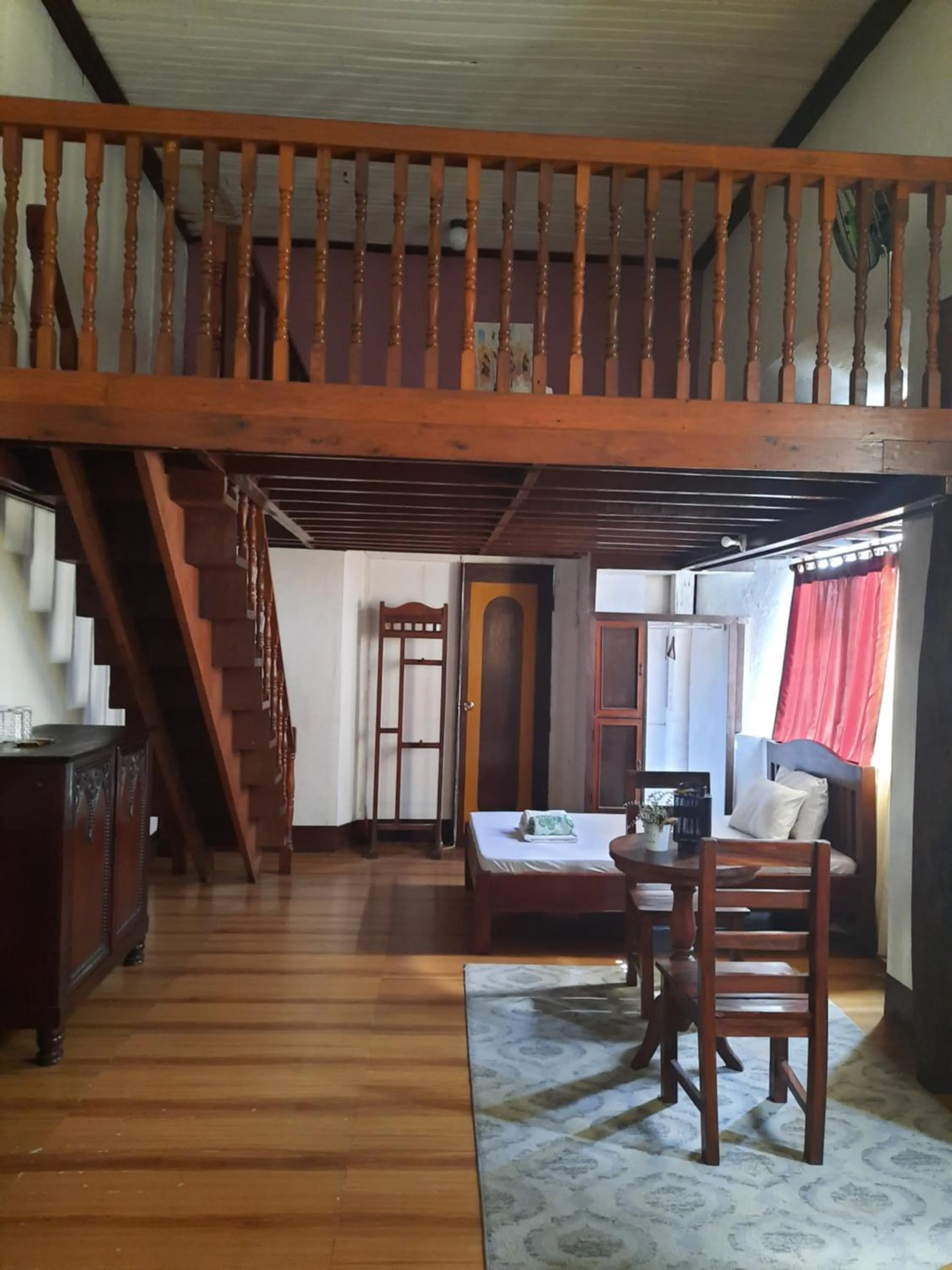 Bed in Escolta's Homey Lodge