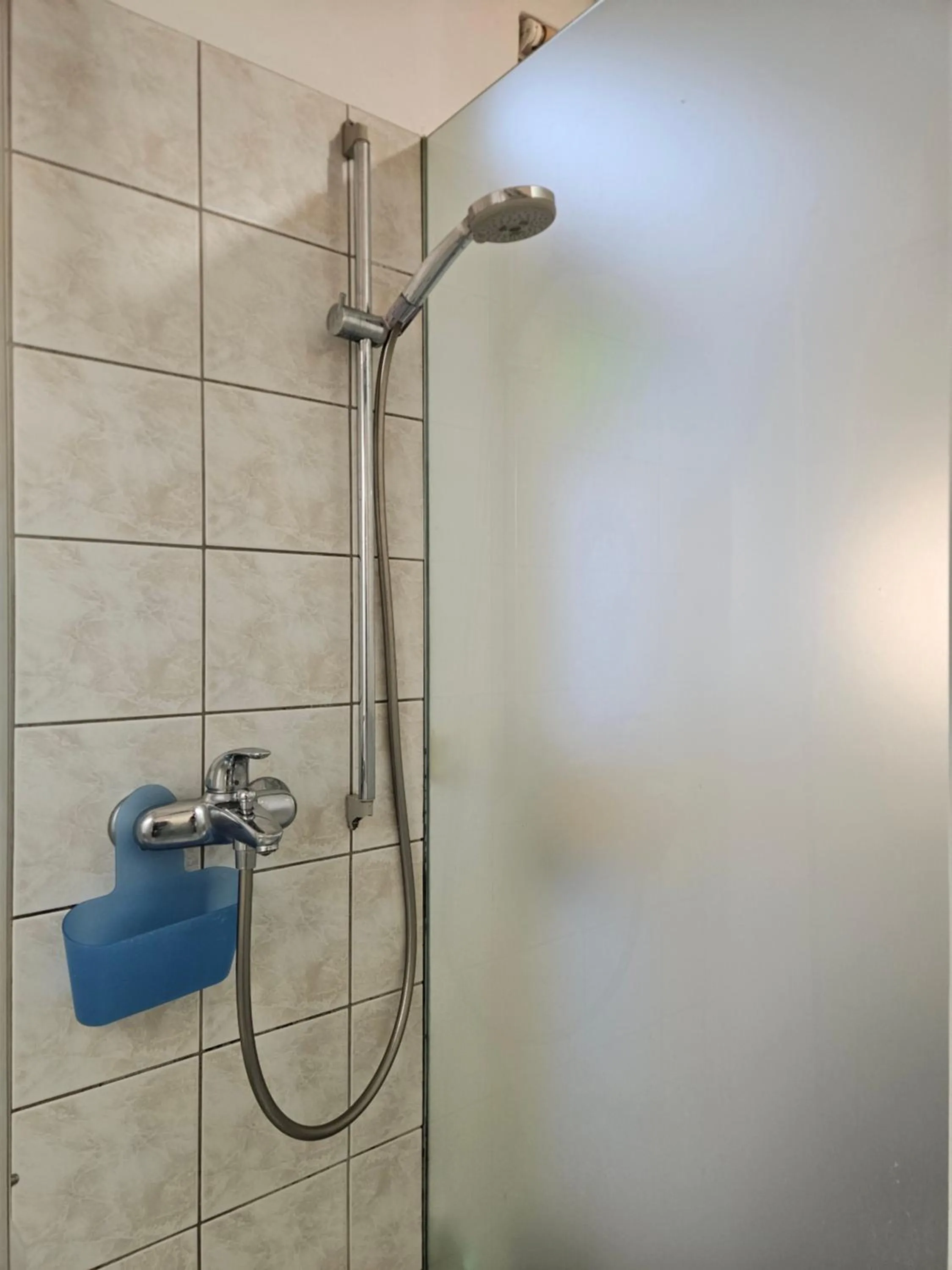 Shower in Tiny central studio apartment Nika Ljubljana