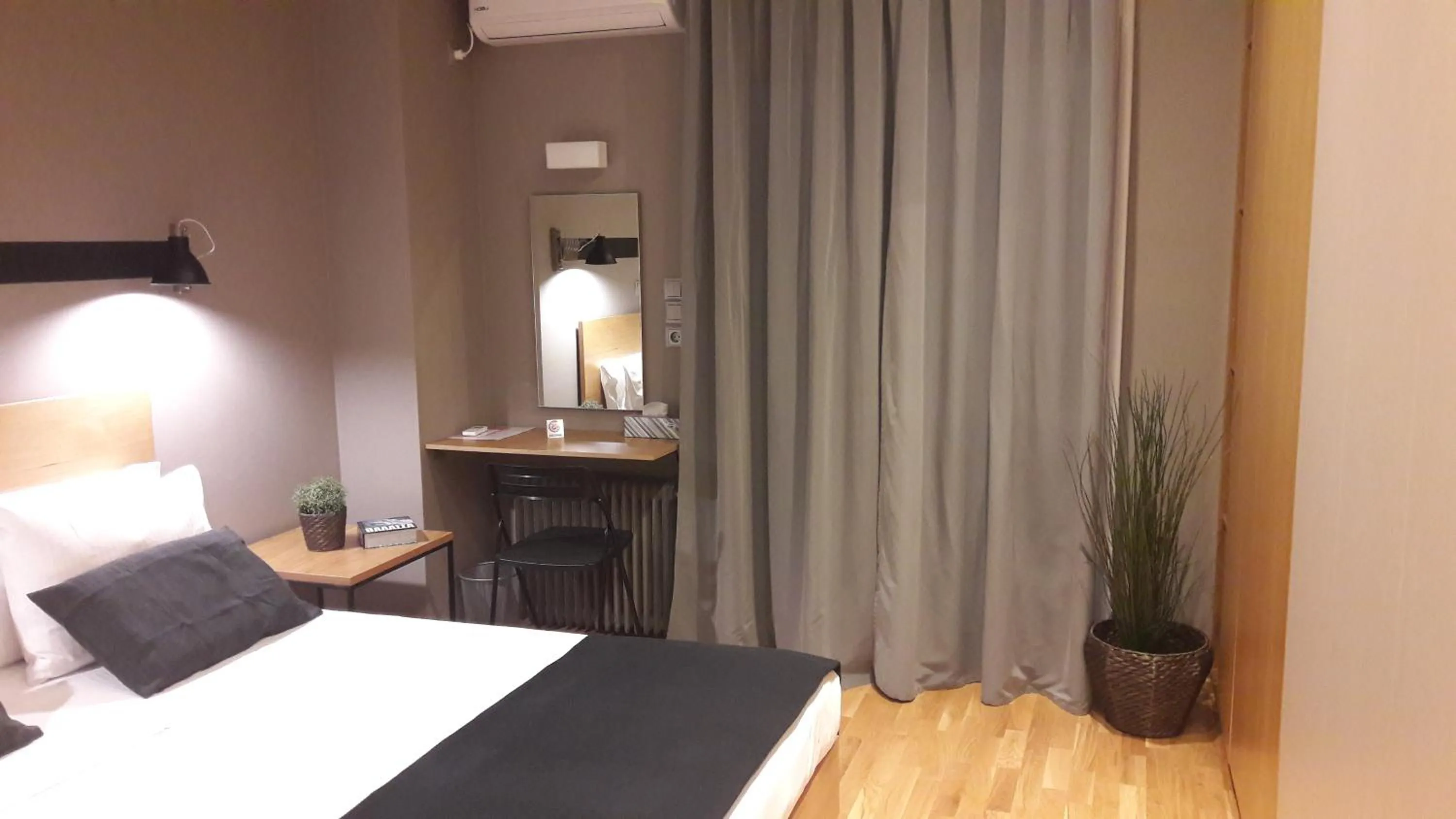 Photo of the whole room, Bed in Phaedra Apartment