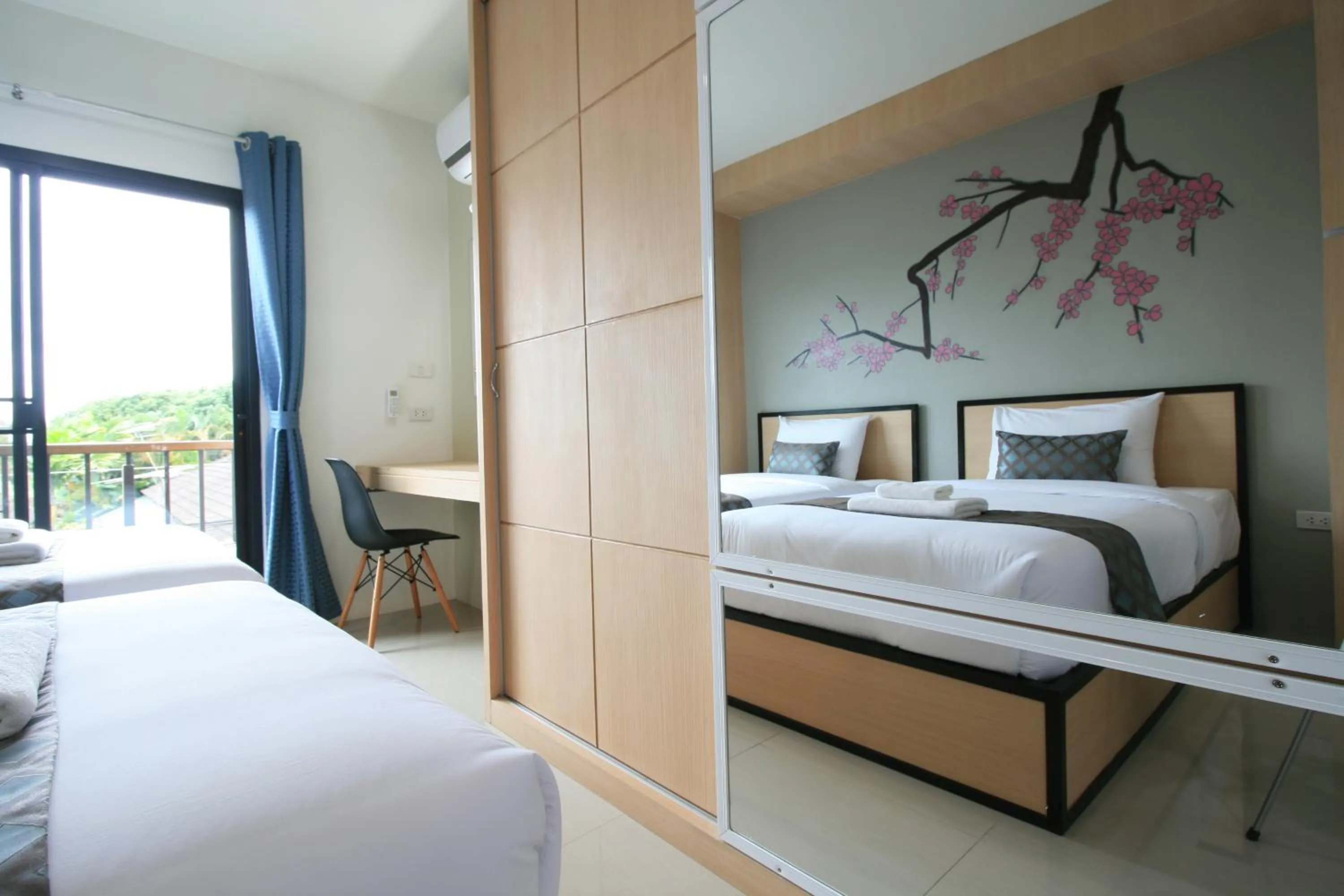 Photo of the whole room, Bed in Sirimunta Hotel Chiang Rai Suite & Residence