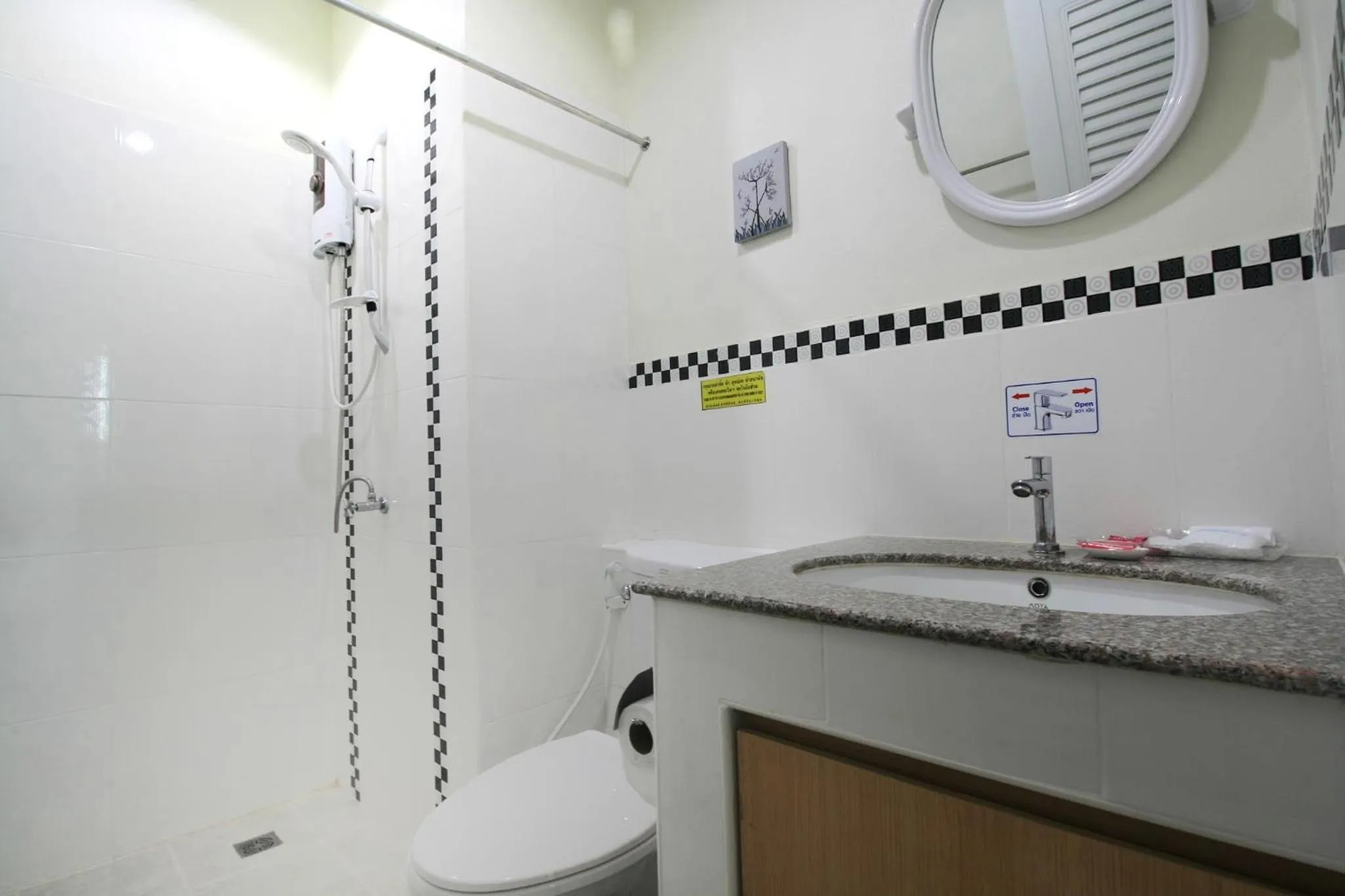 Shower in Sirimunta Hotel Chiang Rai Suite & Residence